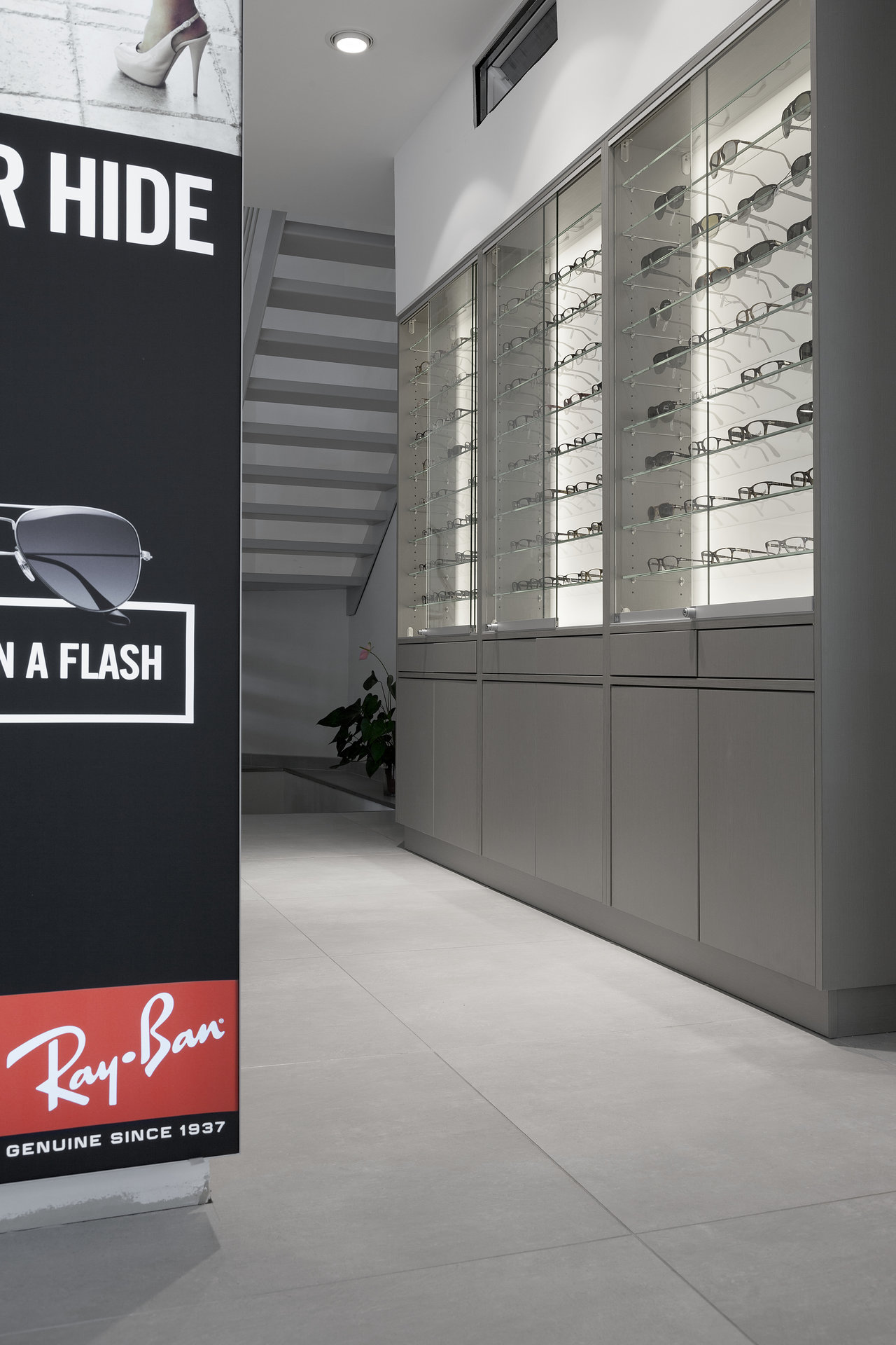 Large-format, light grey tiles as modern flooring.