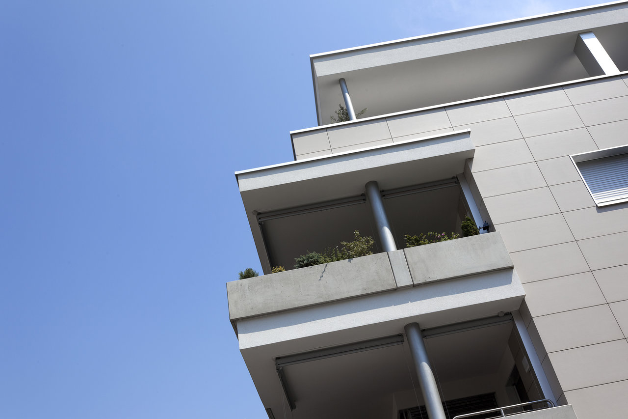 Modern balconies with plants, ideal for high-quality outdoor tiles.