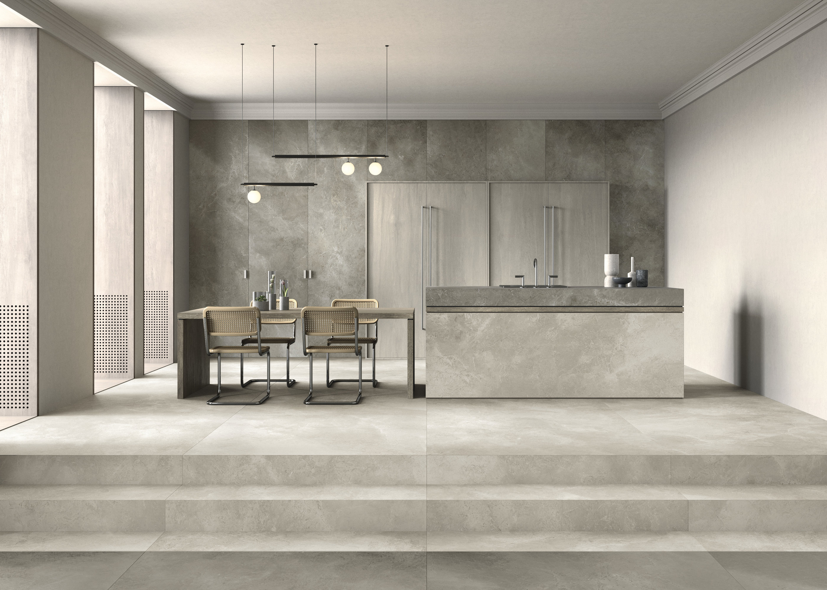 Spacious living area with high-quality tiles: light floor tiles and grey concrete-effect wall tiles.
