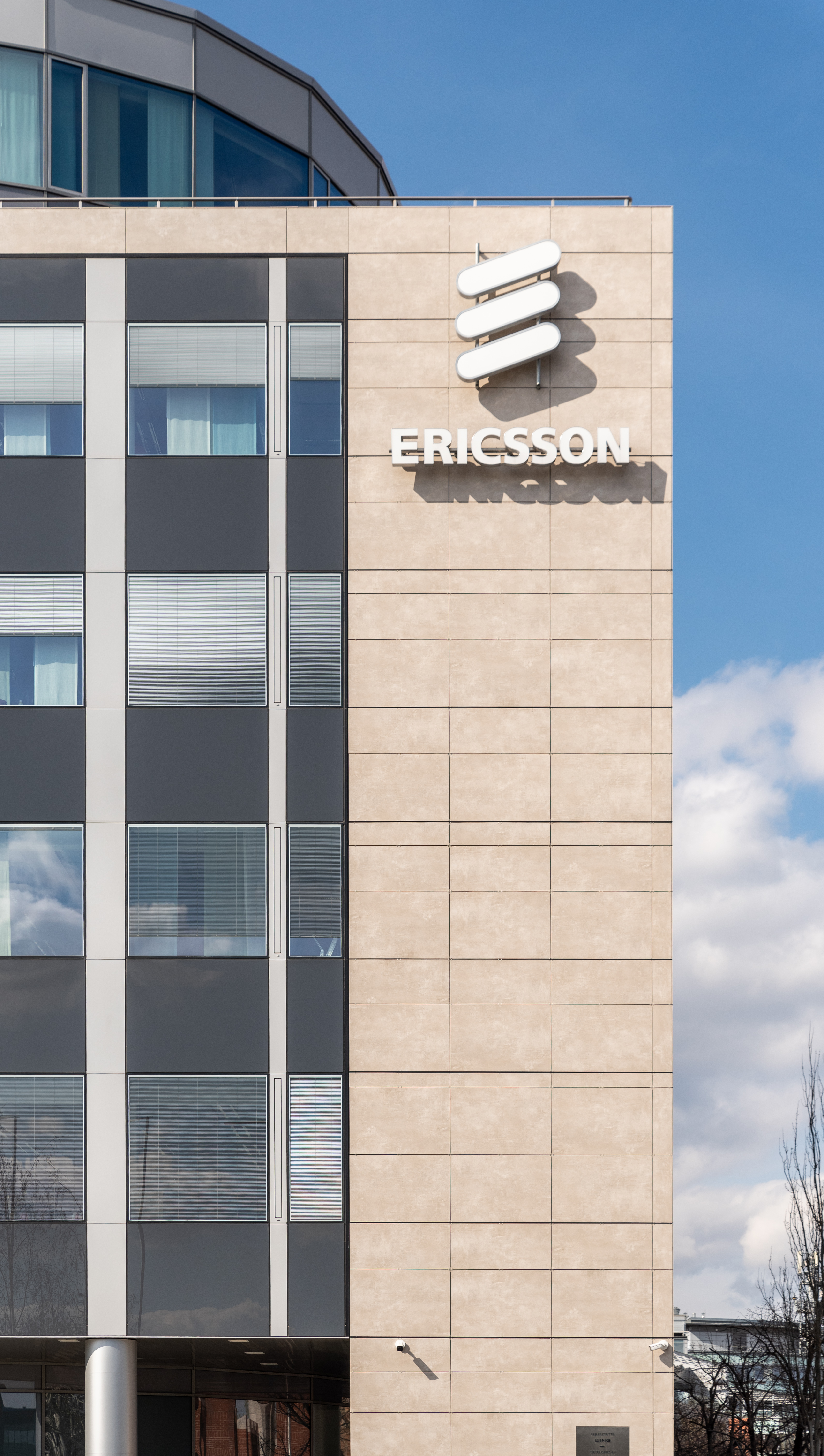 Modern building facade with bright outdoor tiles.