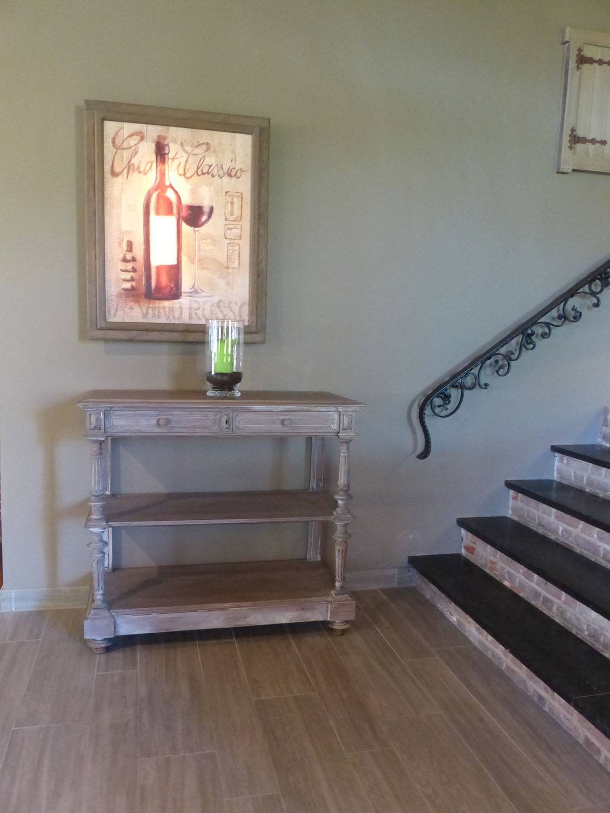 Premium wood-effect tiles in entrance and tiled stairs.