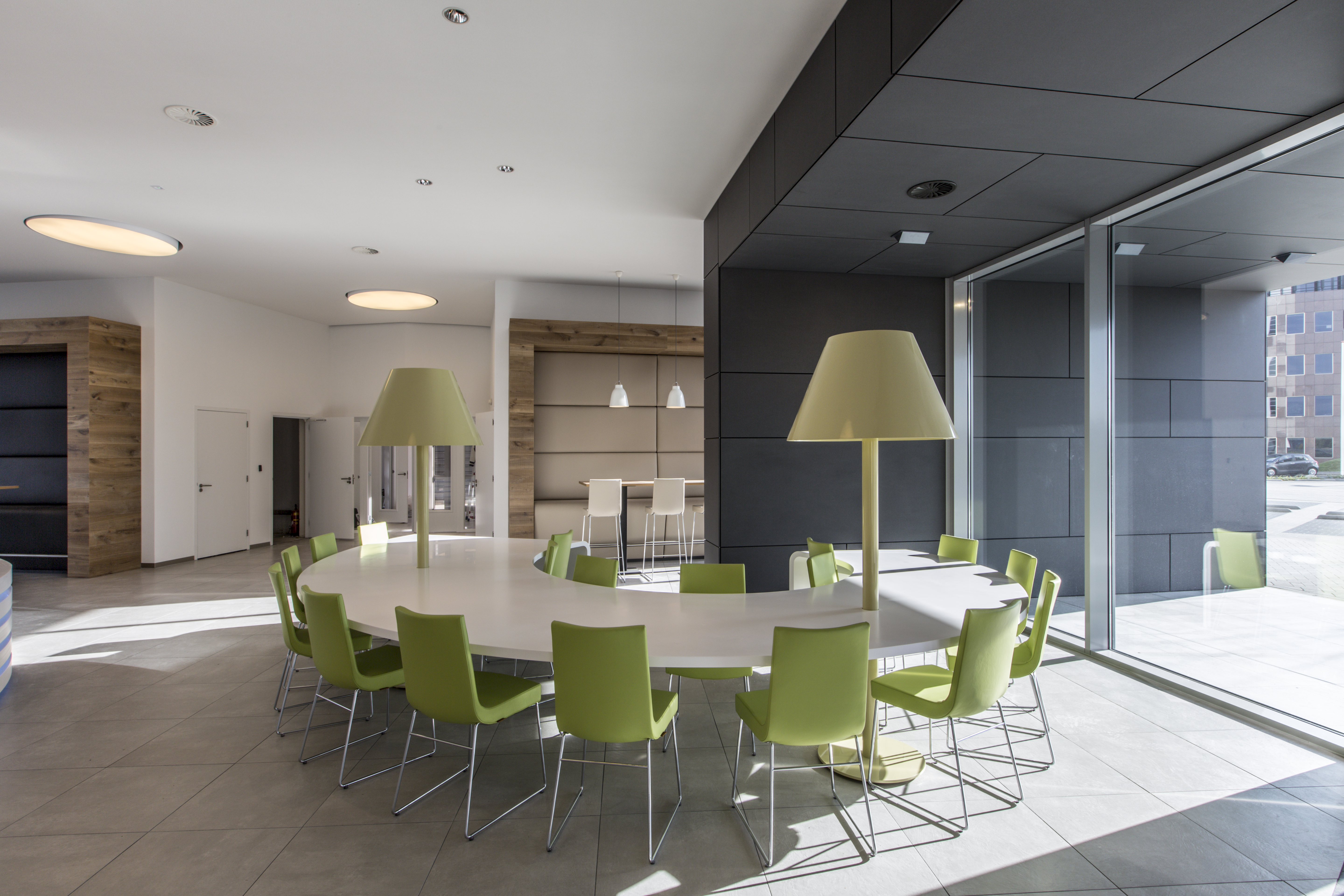 Spacious room with high-quality floor tiles and modern furnishings.