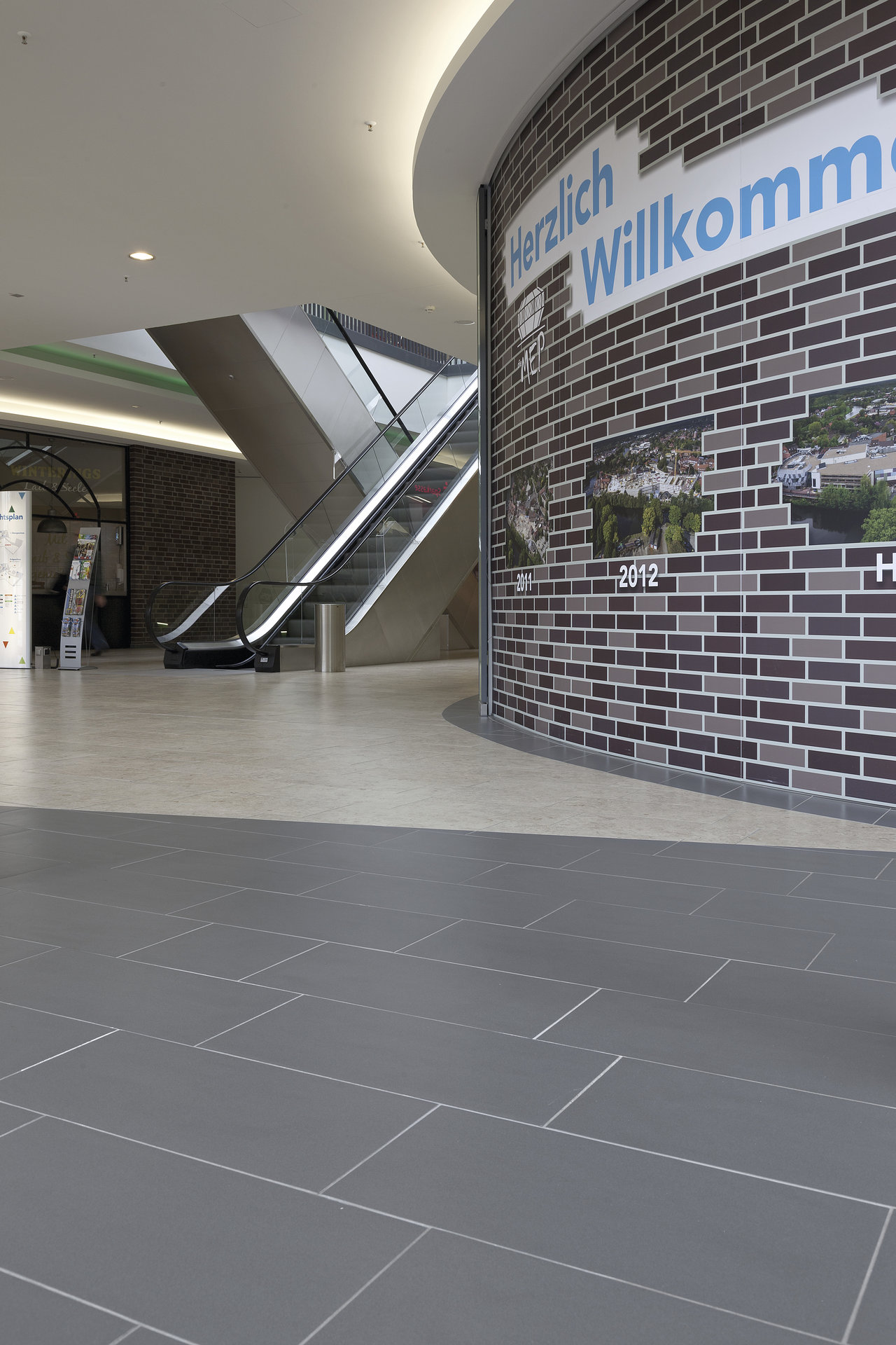 High-quality large-format anthracite indoor floor tiles.