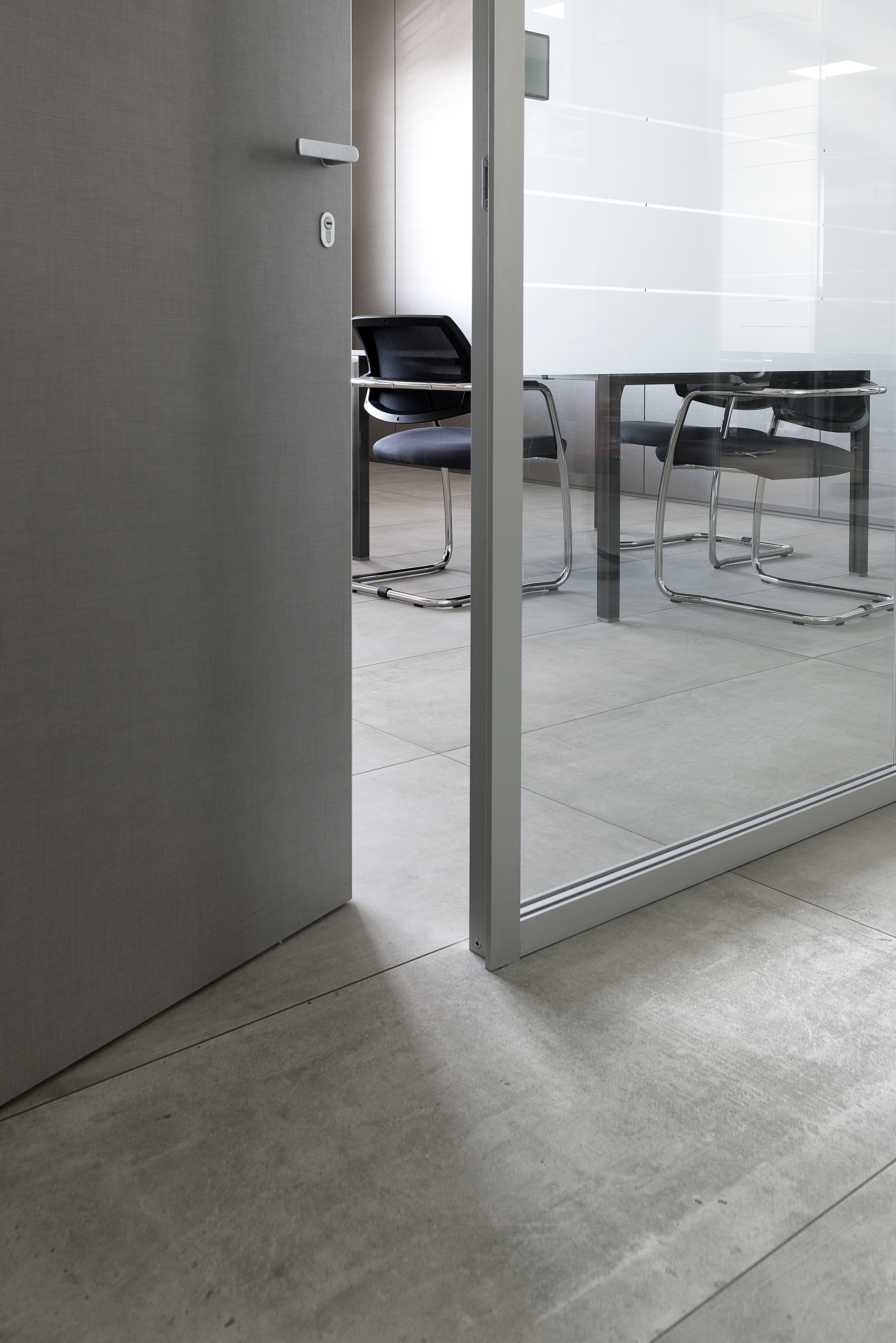 Modern, large-format concrete-effect tiles for stylish interiors.