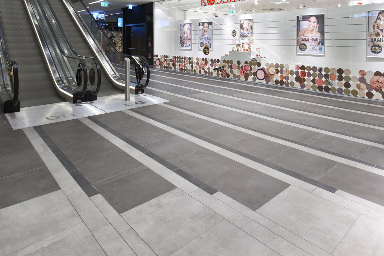 Grey and light grey striped tiles, perfect for modern interiors and high durability.