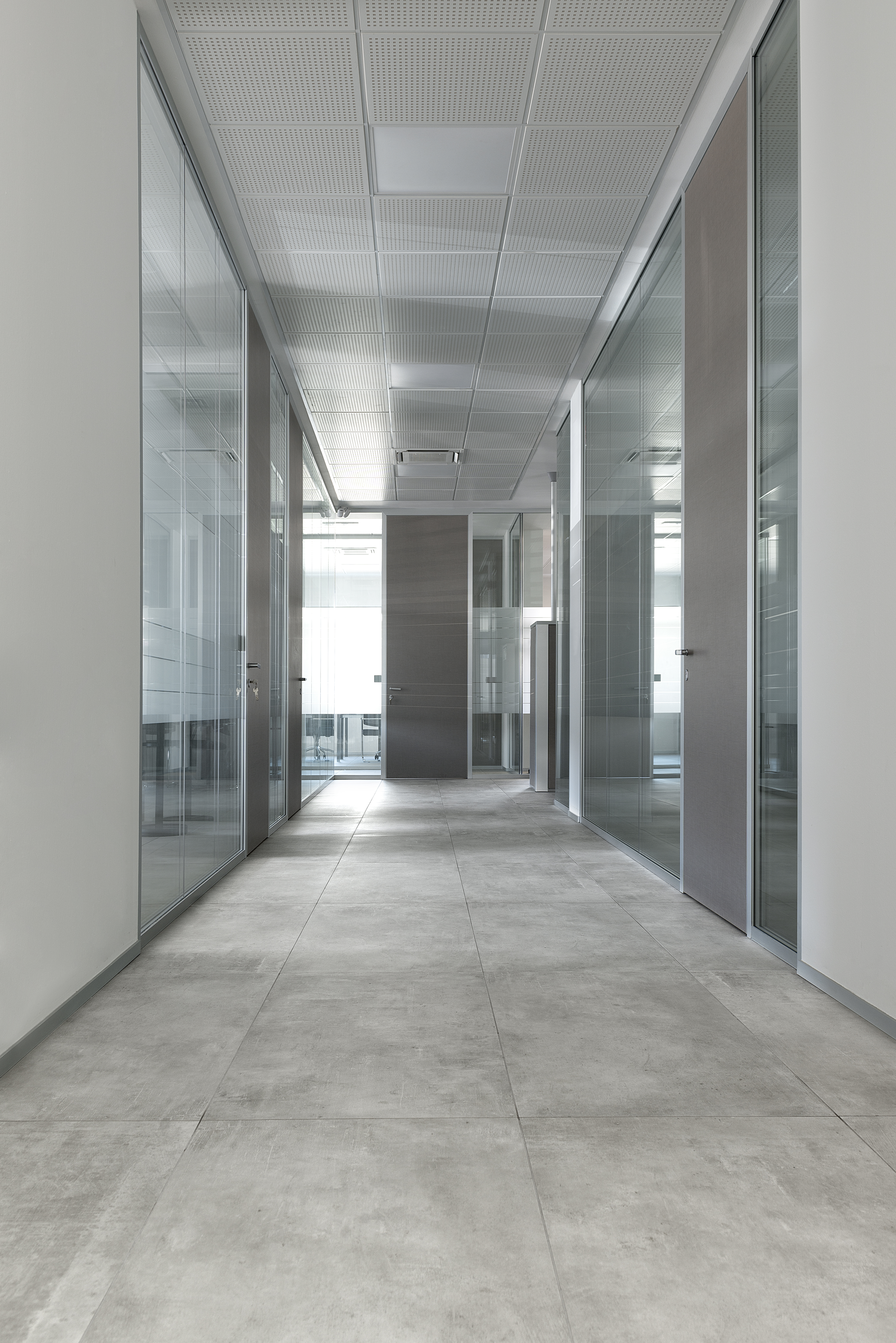 Modern, large-format indoor tiles with a concrete look.