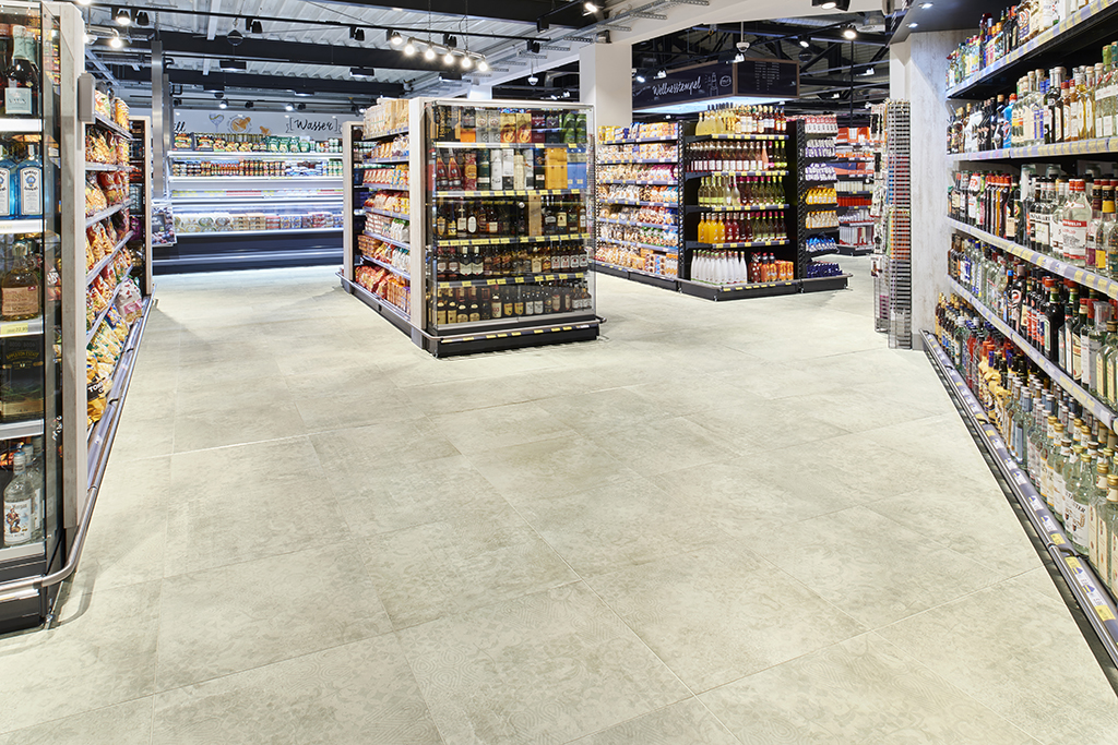 High-quality, light grey tiles, perfect for commercial use in supermarkets.