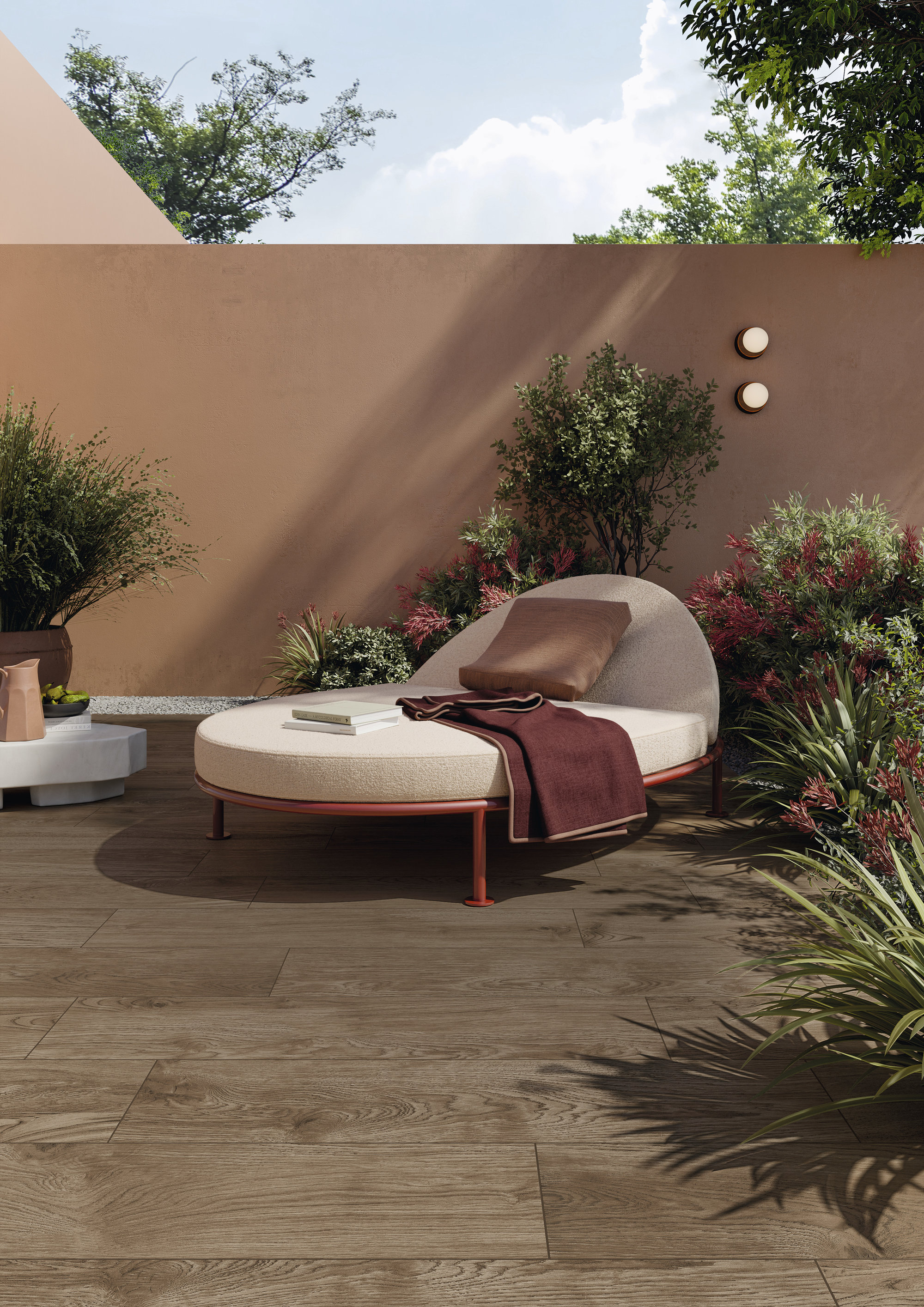 Modern terrace with high-quality wood-look tiles and stylish outdoor lounge.