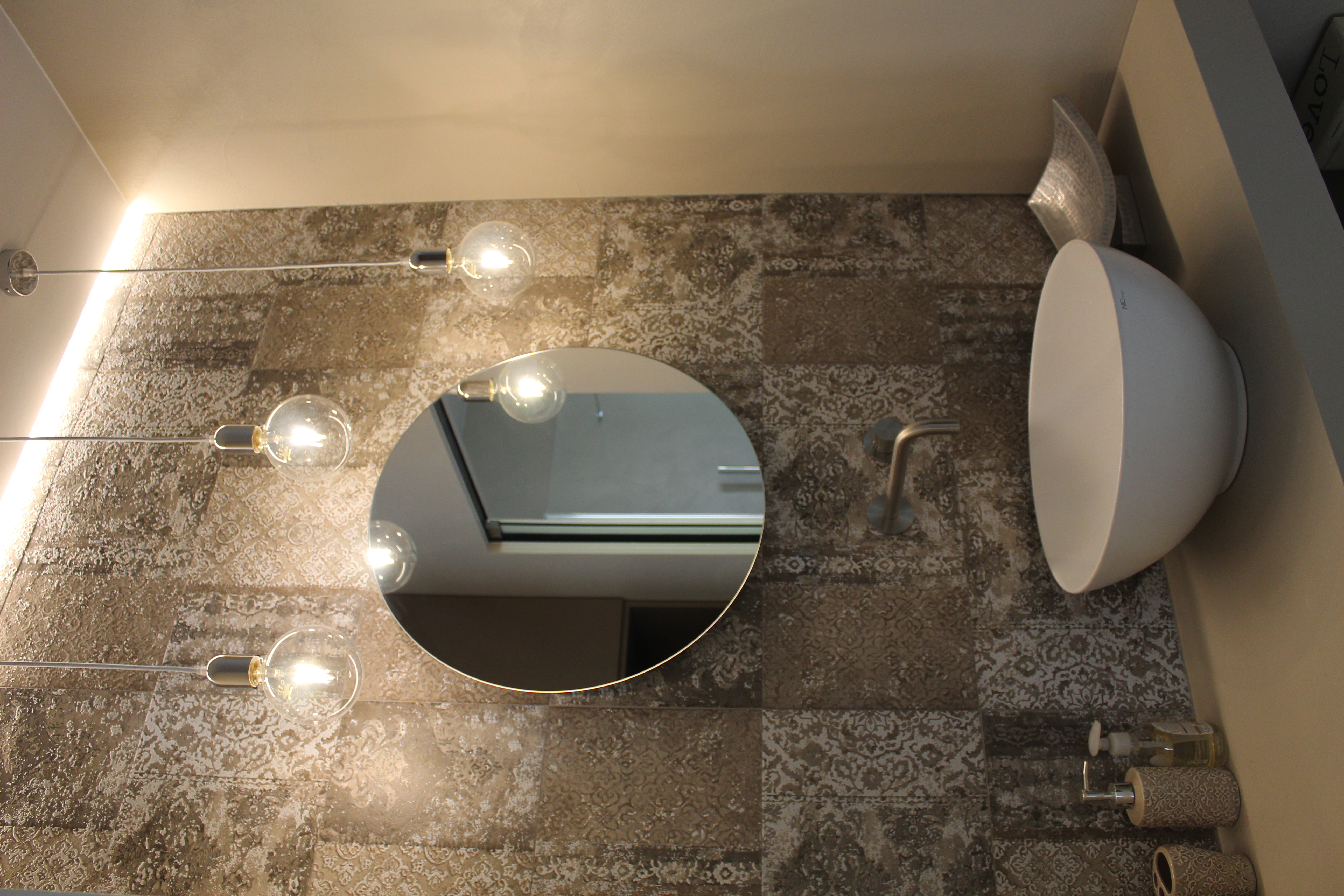 Premium bathroom tiles with ornate design in warm earth tones for a stylish look.
