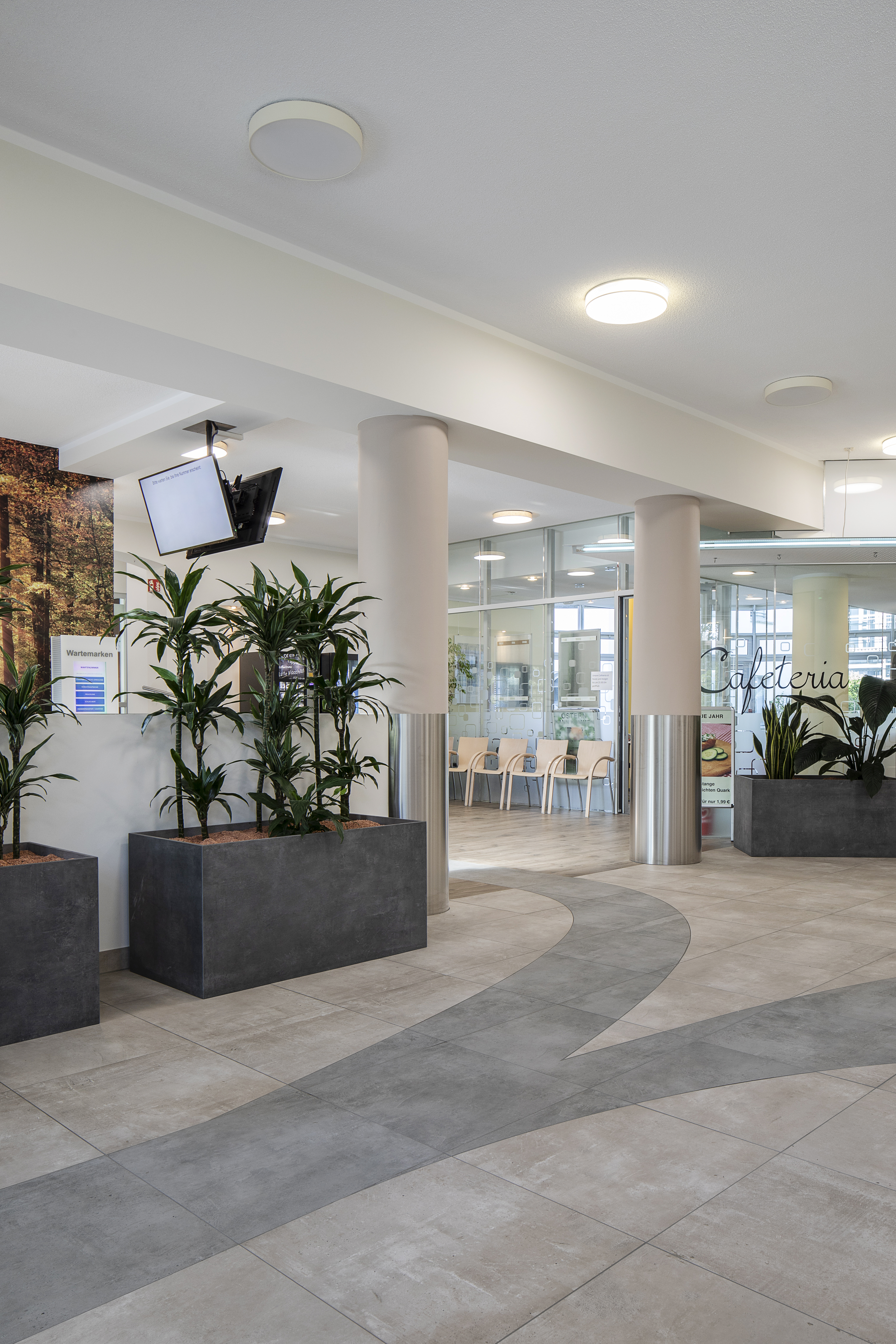 Bright floor tiles with elegant pattern in modern interior.