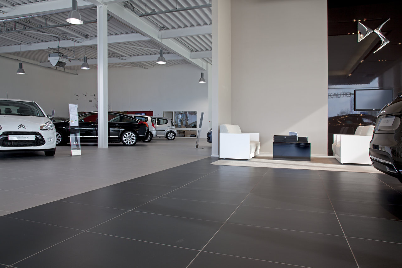Modern anthracite and light grey tiles in a showroom.