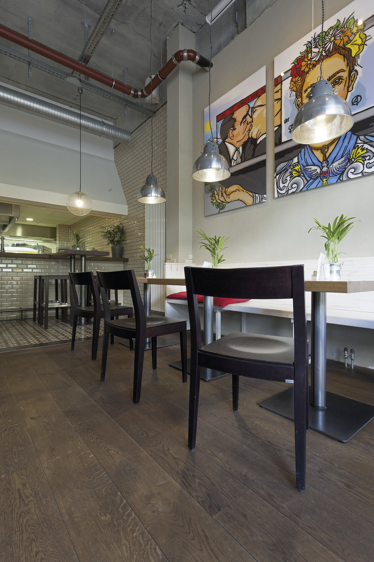 Dark wood-effect tiles in a modern restaurant.