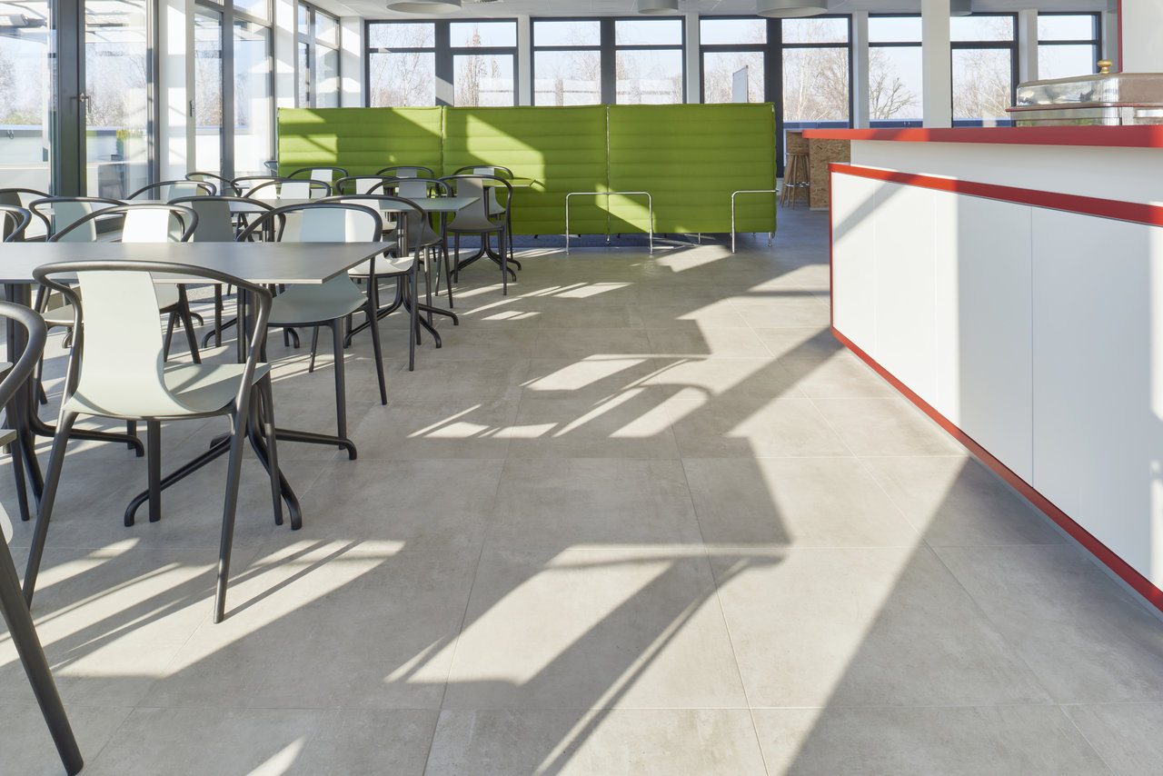 Modern, large-format light grey tiles for stylish interiors.