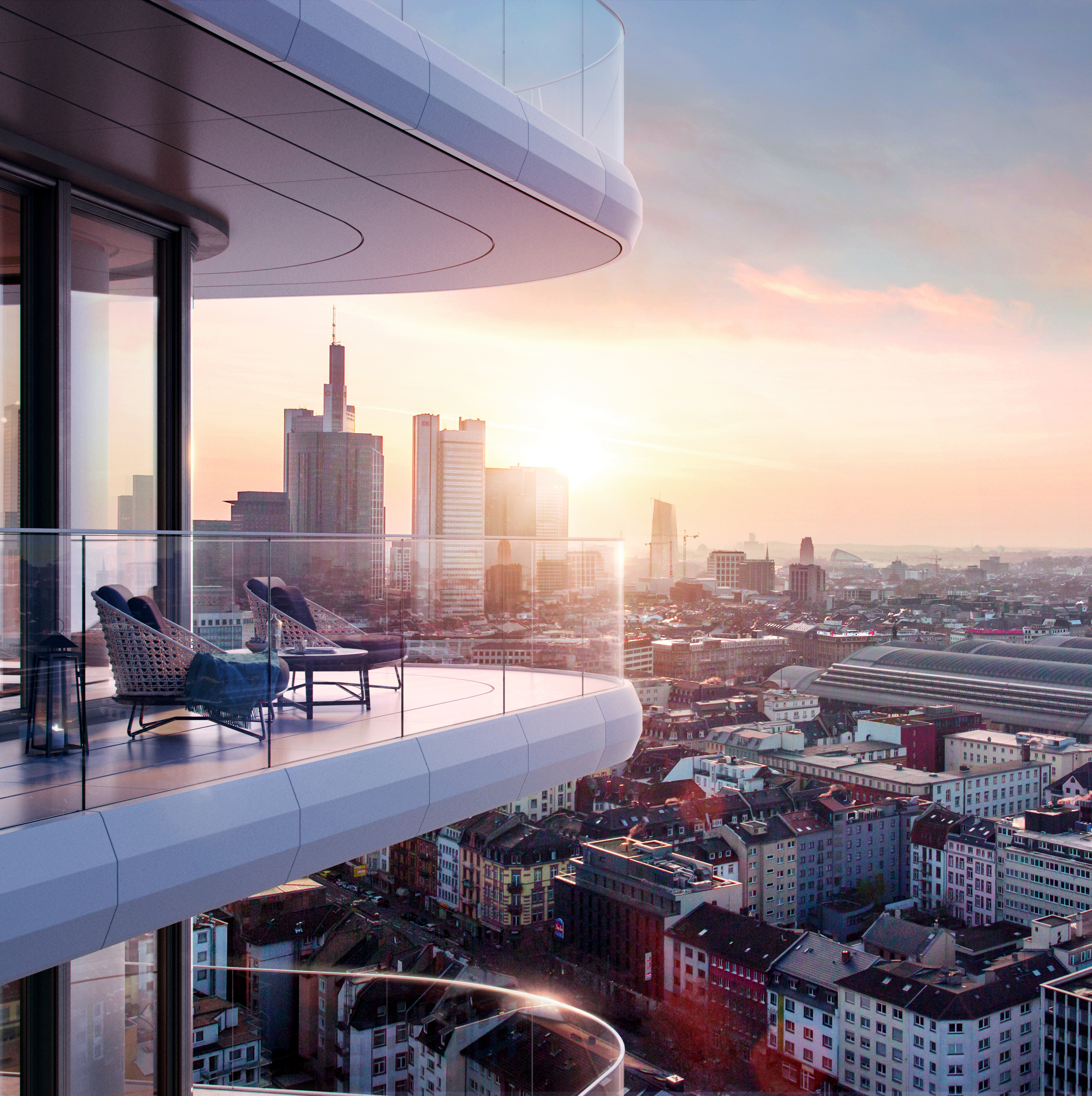 High-quality outdoor tiles on a modern balcony with a city panorama at sunset.