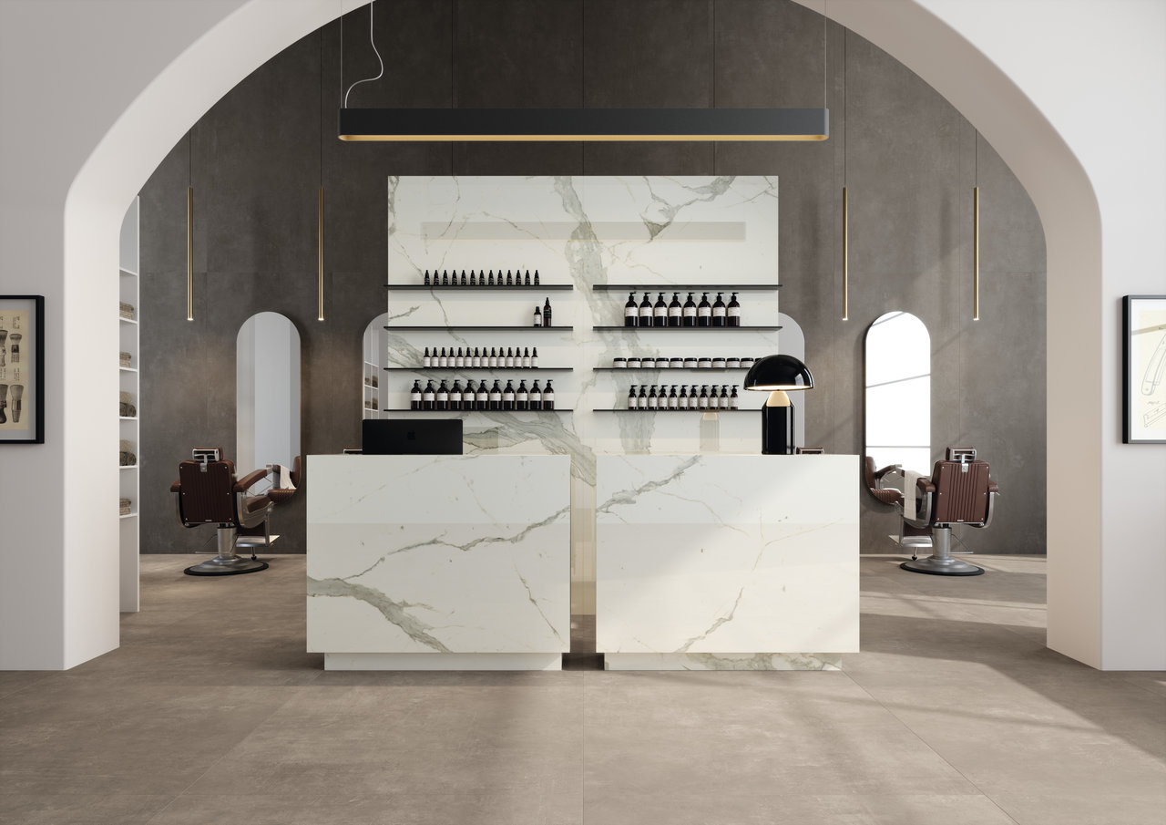 Luxurious Porcelaingres marble-effect tiles for reception, walls, and matching floor.