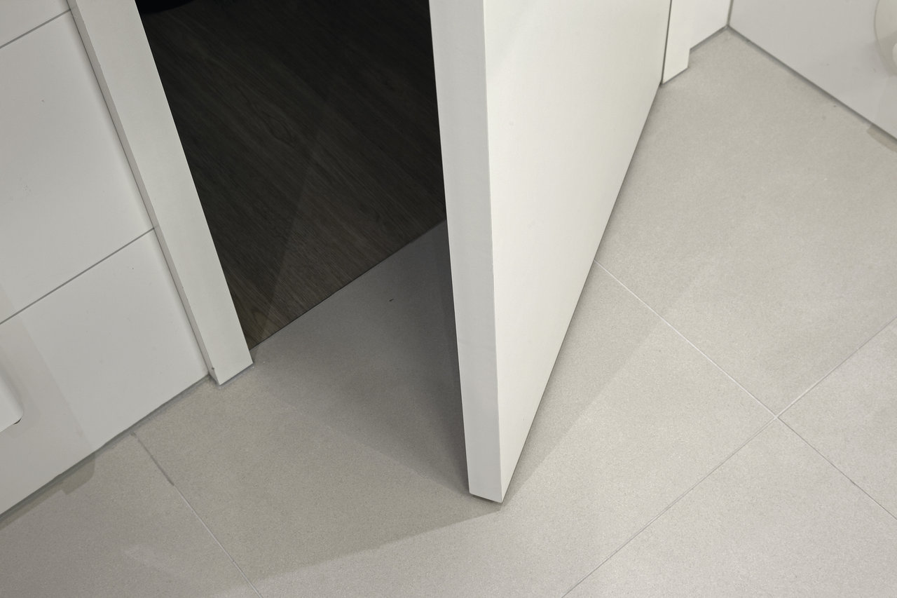 Elegant light grey indoor tiles.