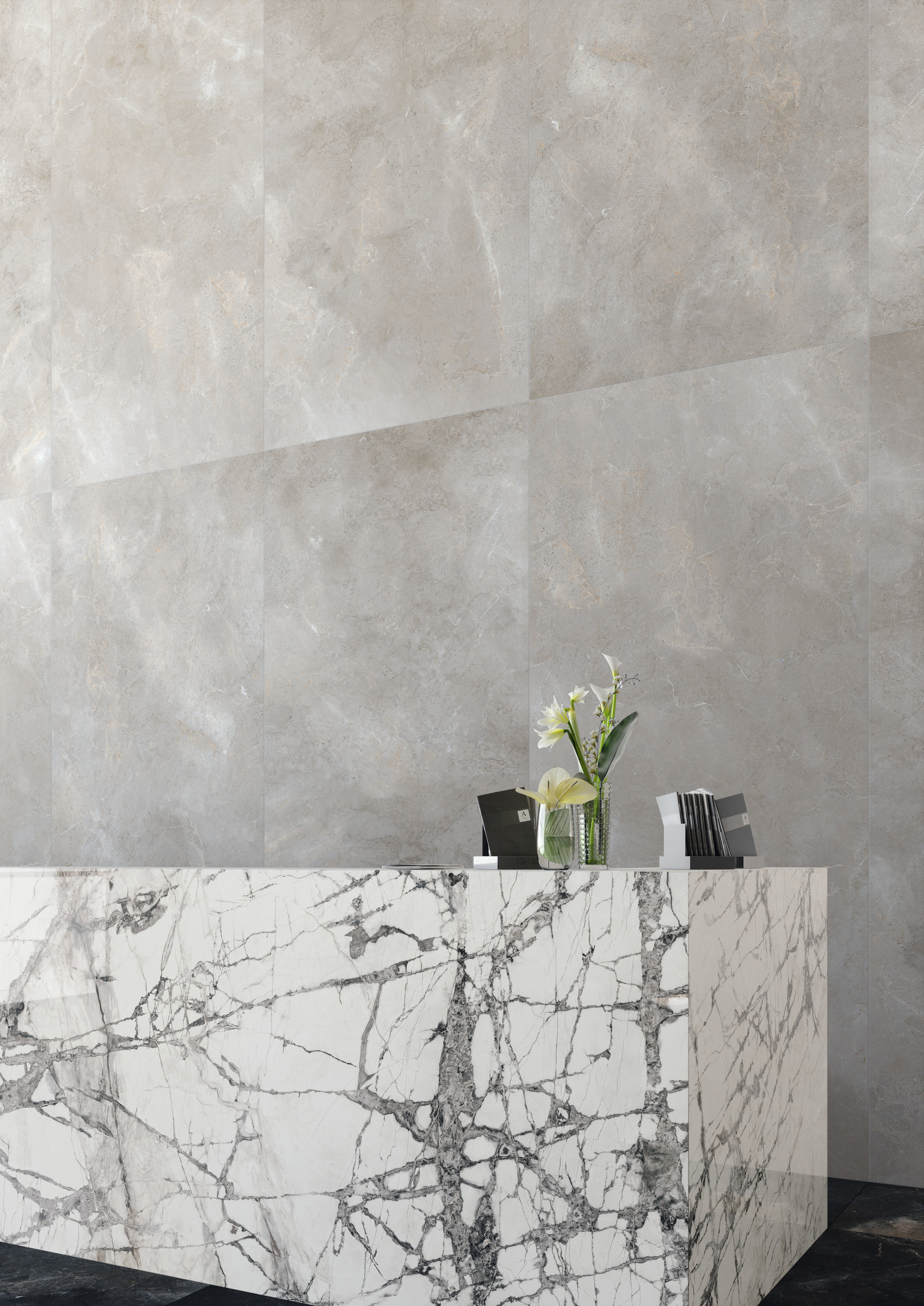 Light grey wall tiles and a white marble-effect counter.