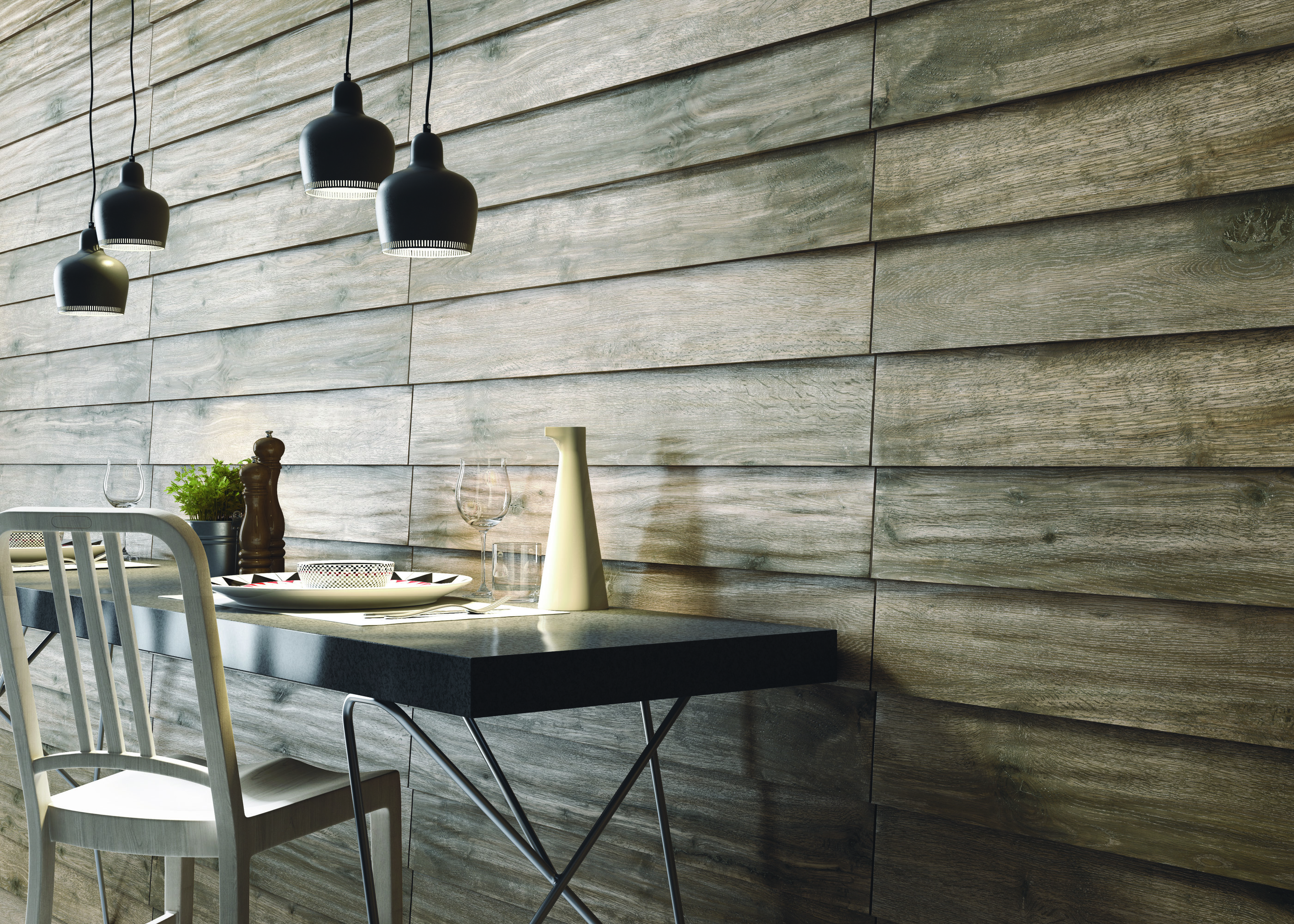 Grey wood-effect wall tiles for a modern dining area.