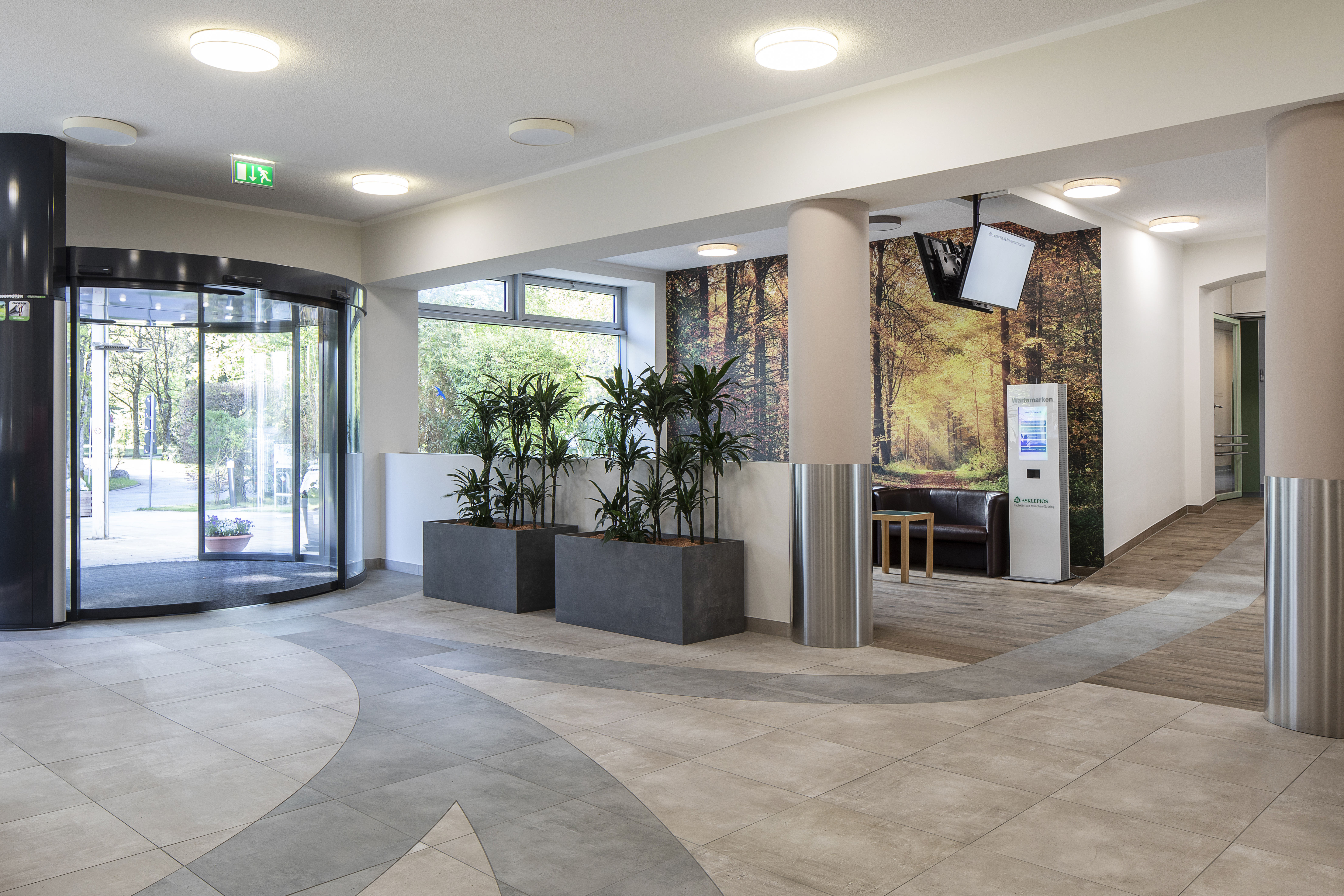 Elegant swirl pattern floor tiles for modern entrances.