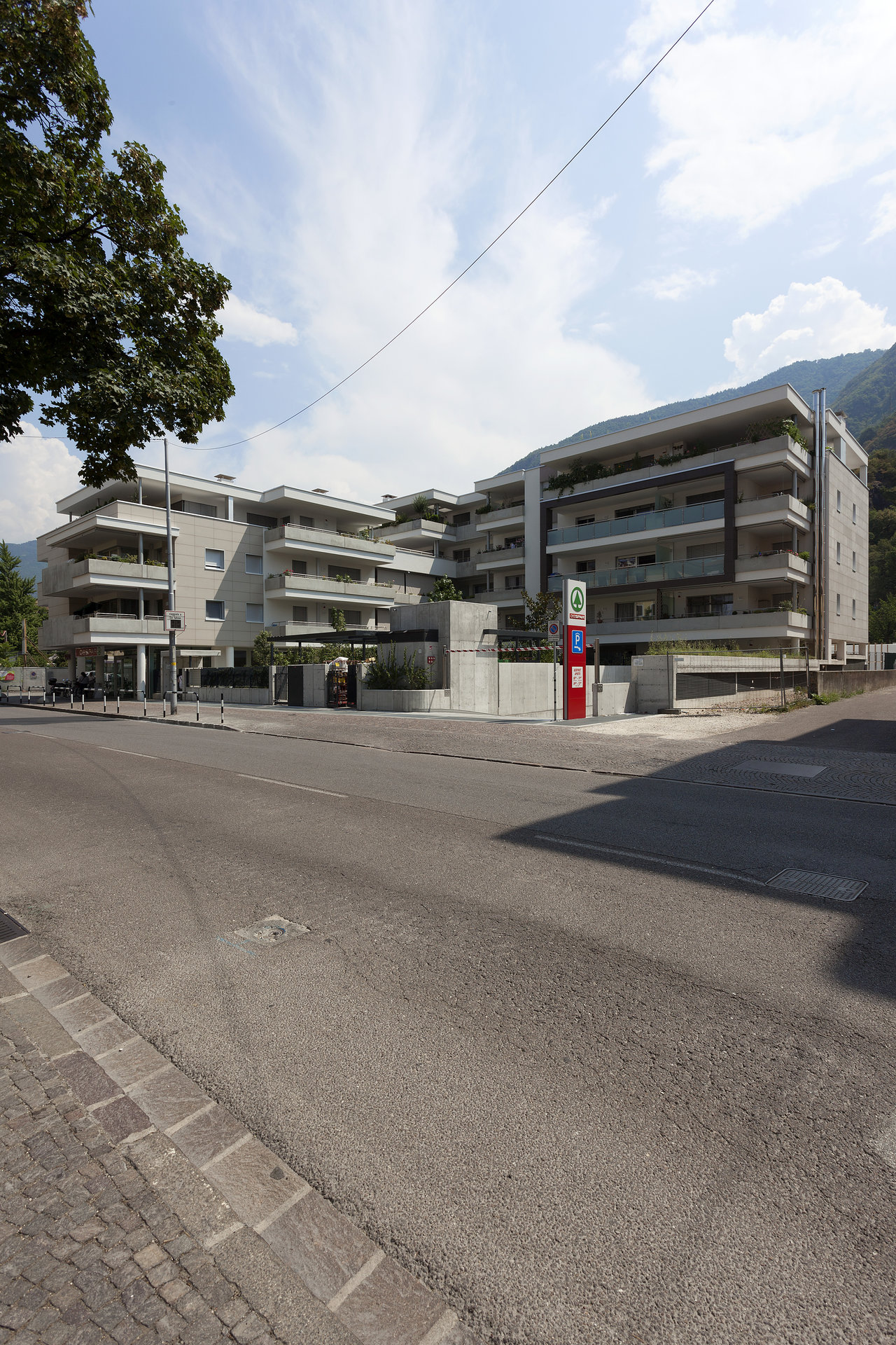Modern apartment building with balconies, perfect for high-quality outdoor tiles.