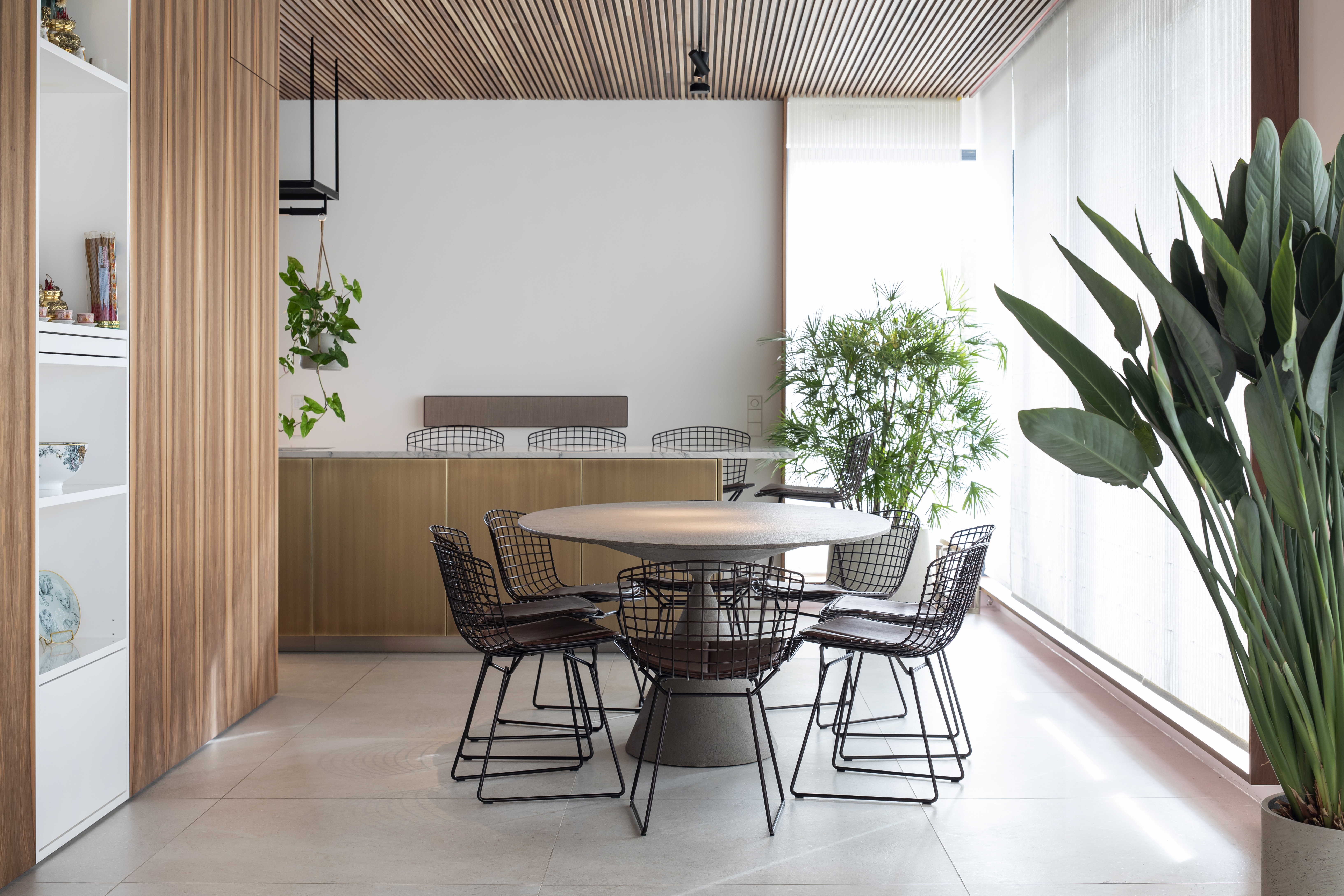 Bright, modern room with elegant tiled floor, wood accents and designer furniture.
