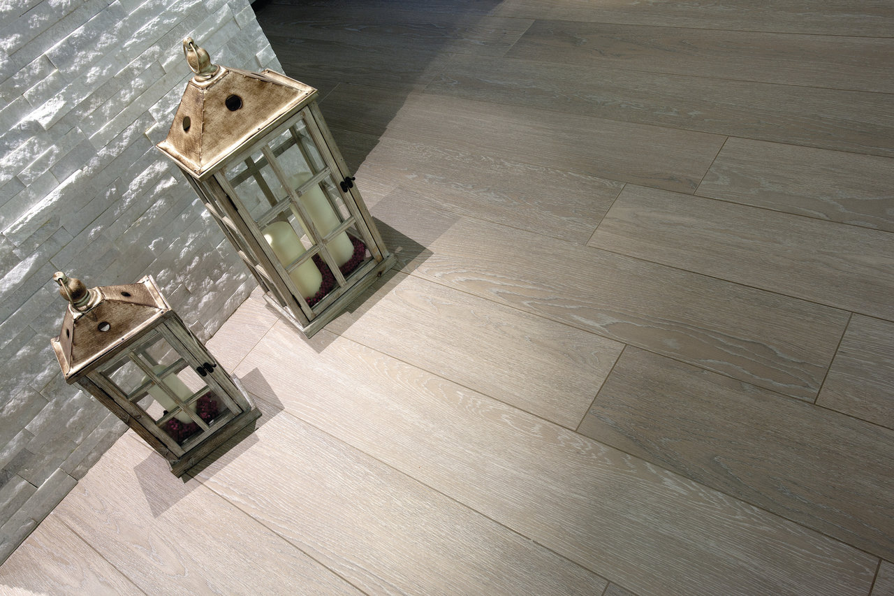 Light grey wood-effect indoor tiles.