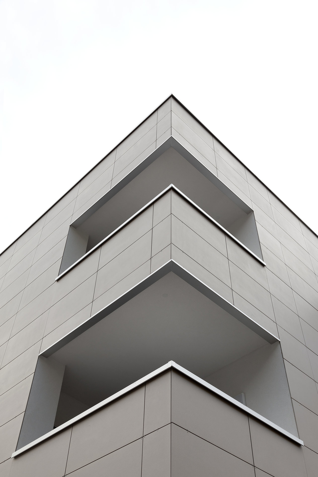 Modern architecture with grey facade tiles.