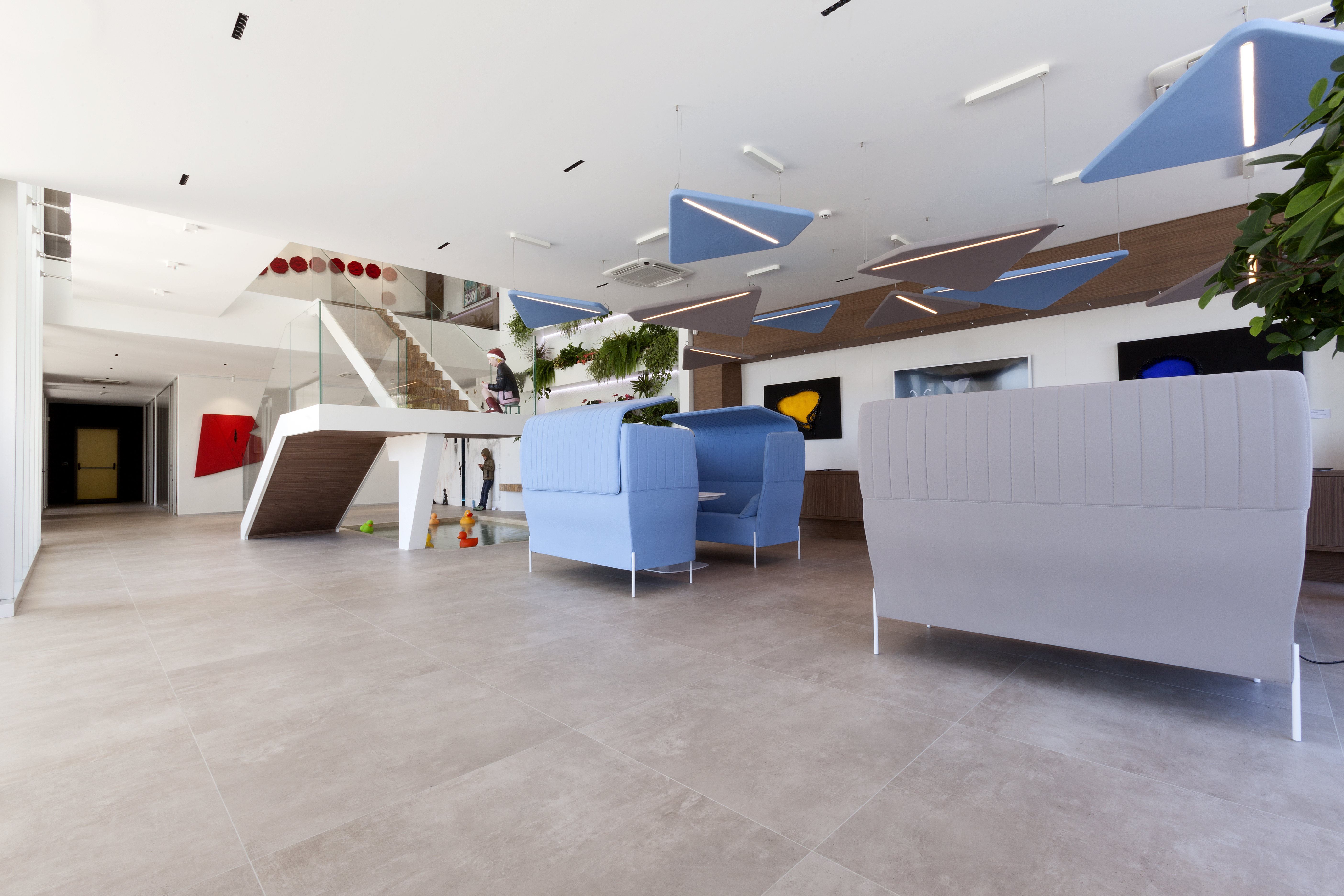 High-quality, large-format tiles in a stylish, modern reception area.