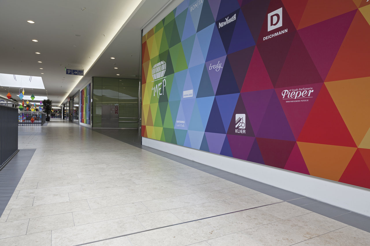 Bright, durable tiles for high-traffic indoor areas, perfect for shopping centres.