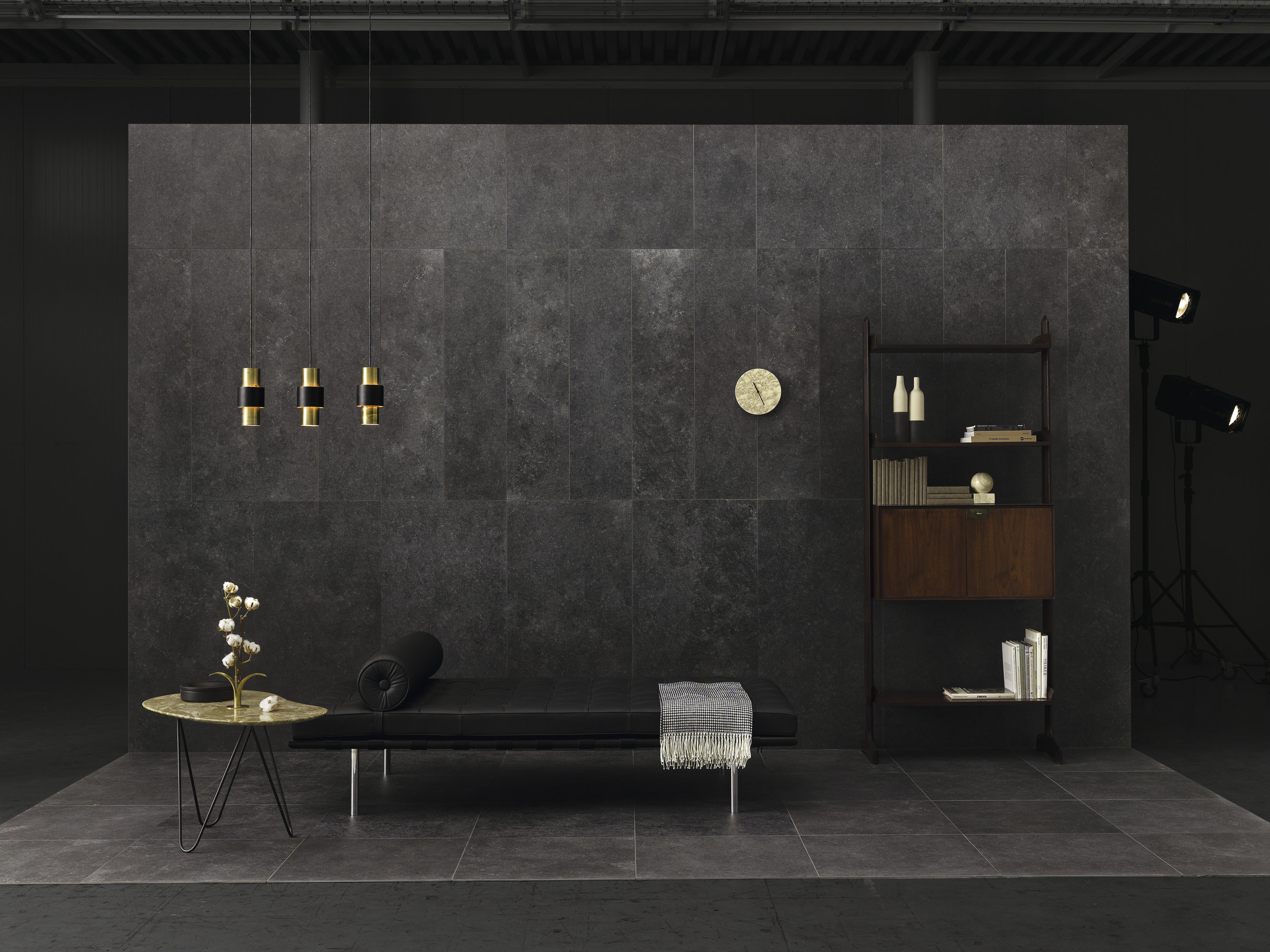 Dark, large-format wall & floor tiles in an elegant, modern setting.