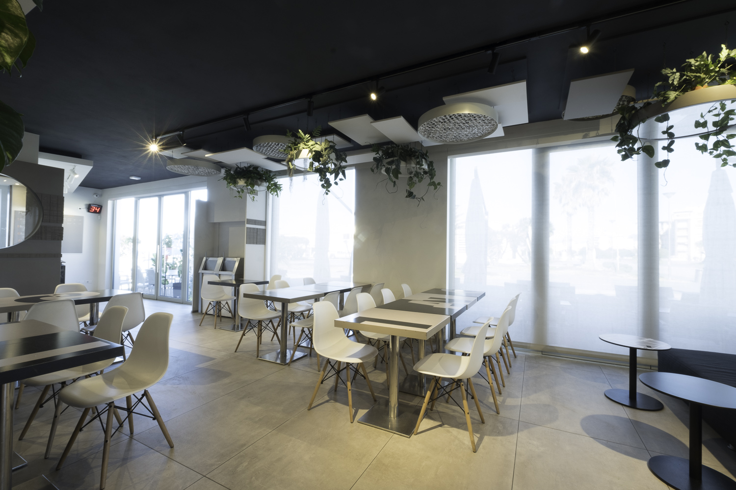 Porcelaingres design floor tiles in a modern hospitality area.
