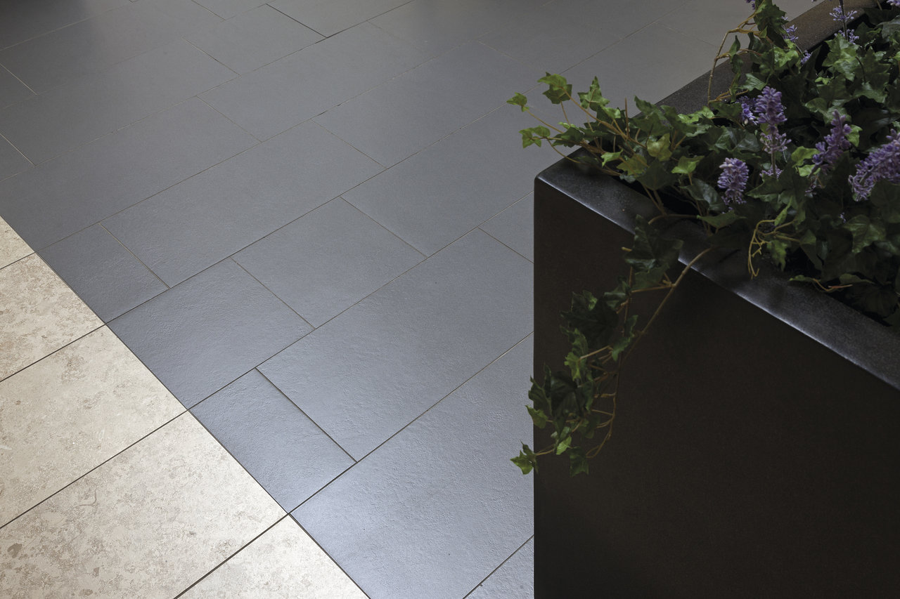Stylish dark & light grey diagonal tiles with planter. Ideal for indoor/outdoor use.