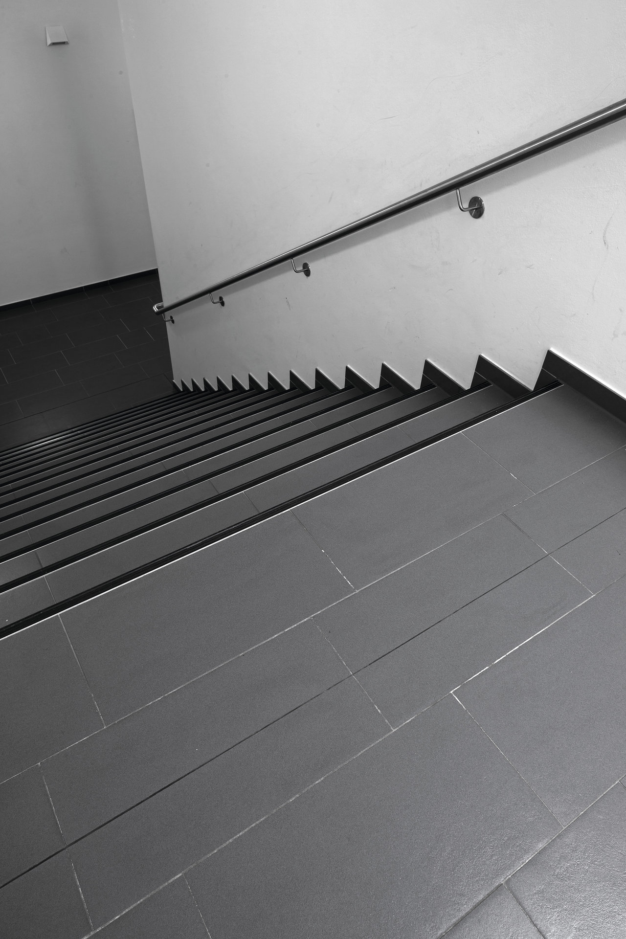 Anthracite tiled stairs, perfect for modern interiors.