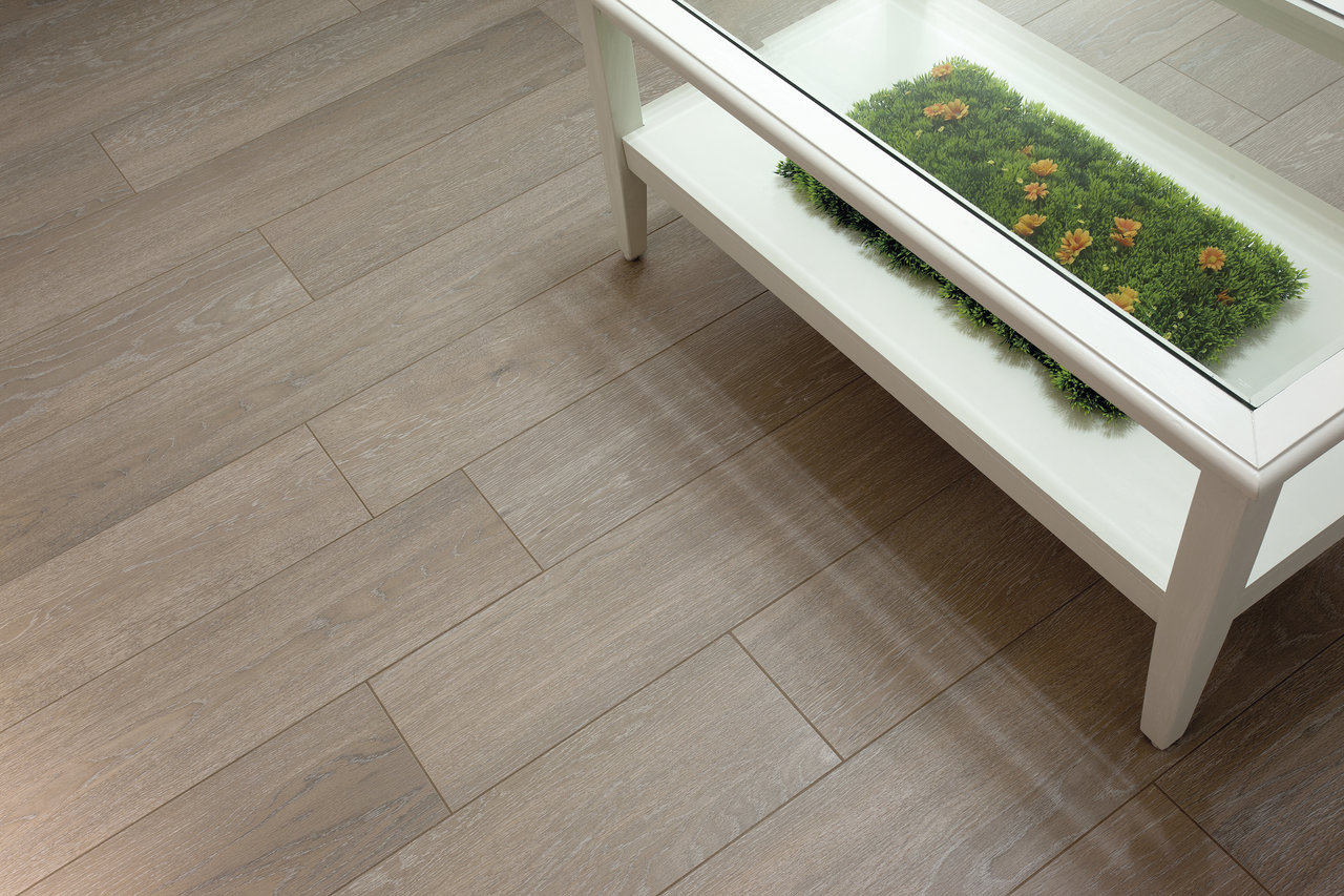 Modern tiles in light wood look, ideal for living spaces.