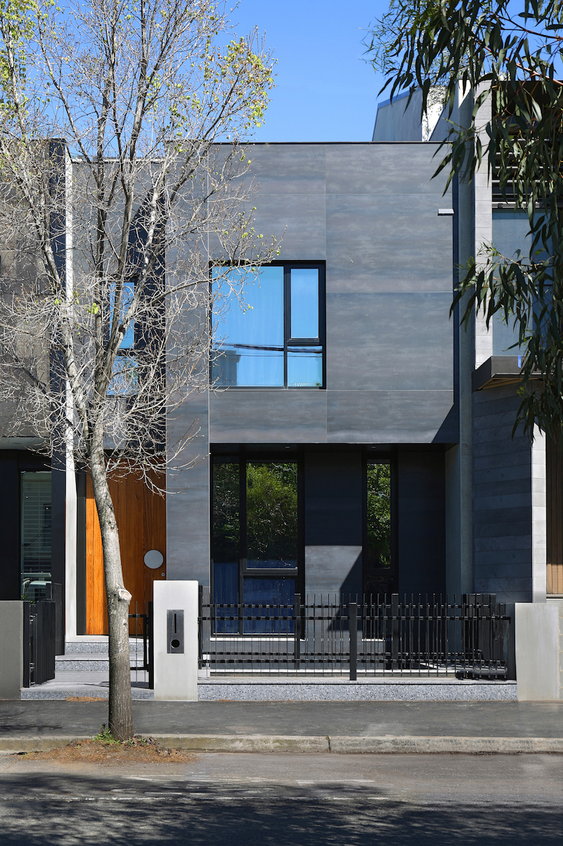 Elegant house with anthracite outdoor facade tiles.