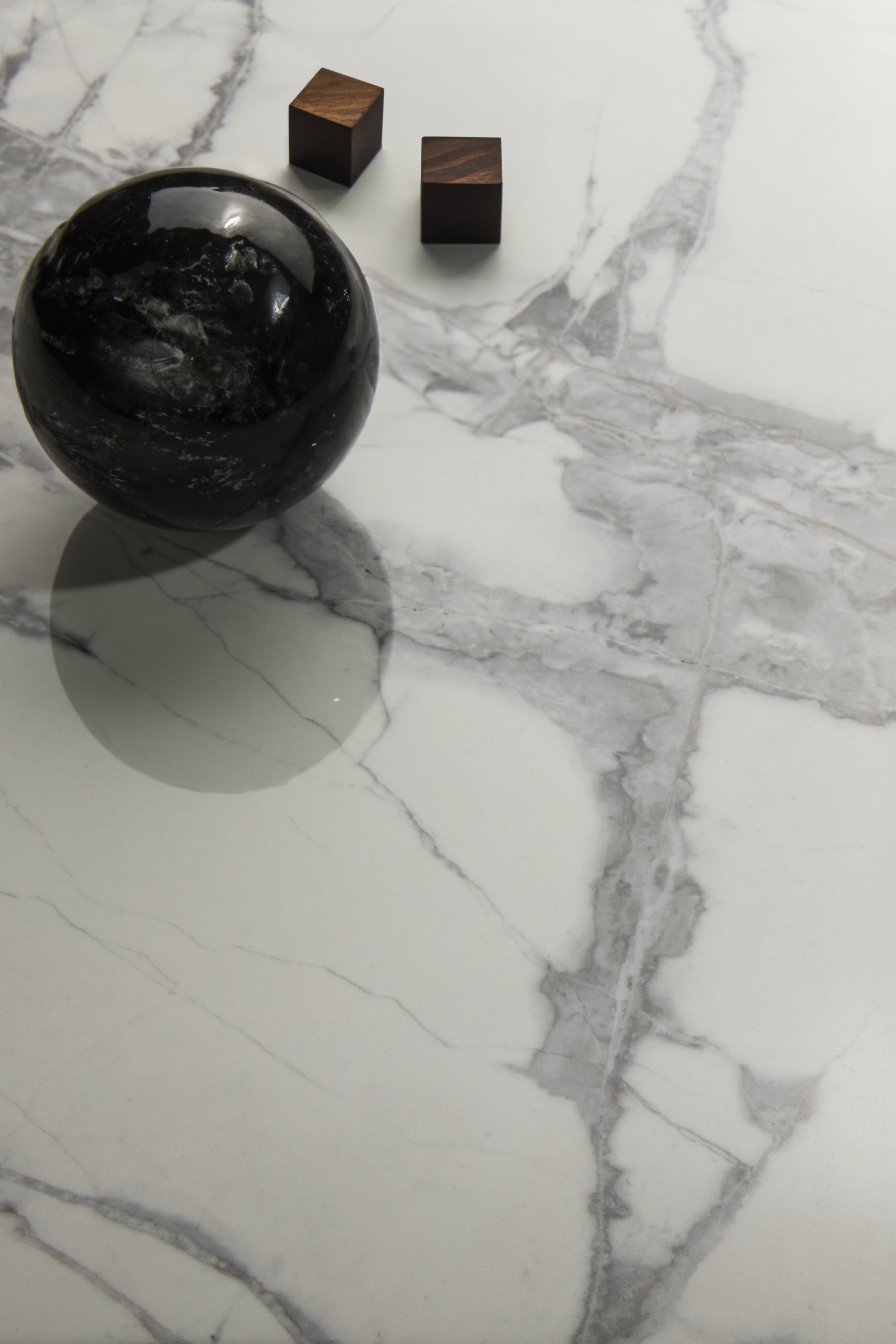 Elegant white tile with striking grey marbling.