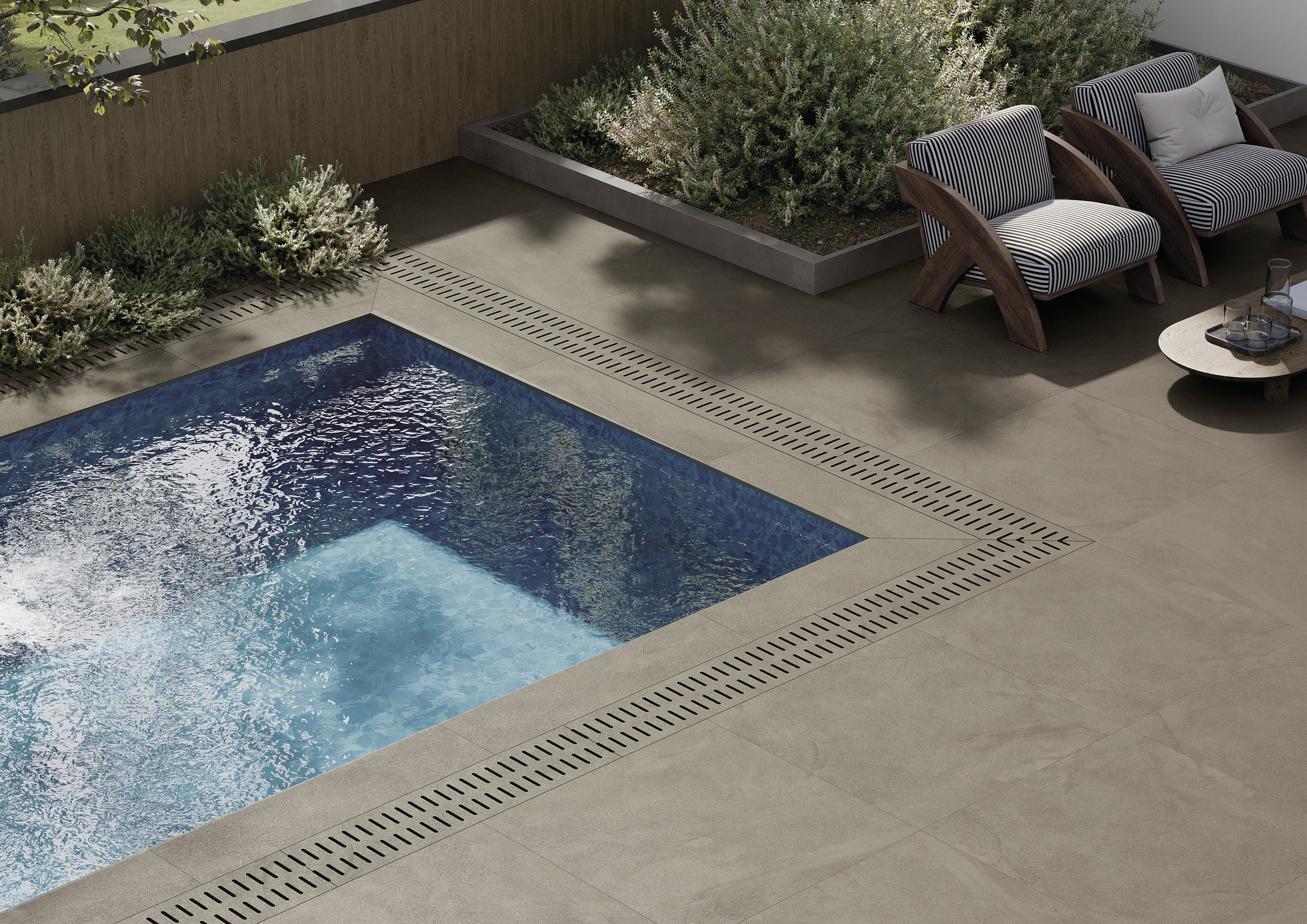 Large outdoor tiles for pool & terrace, perfect for luxury outdoor spaces.