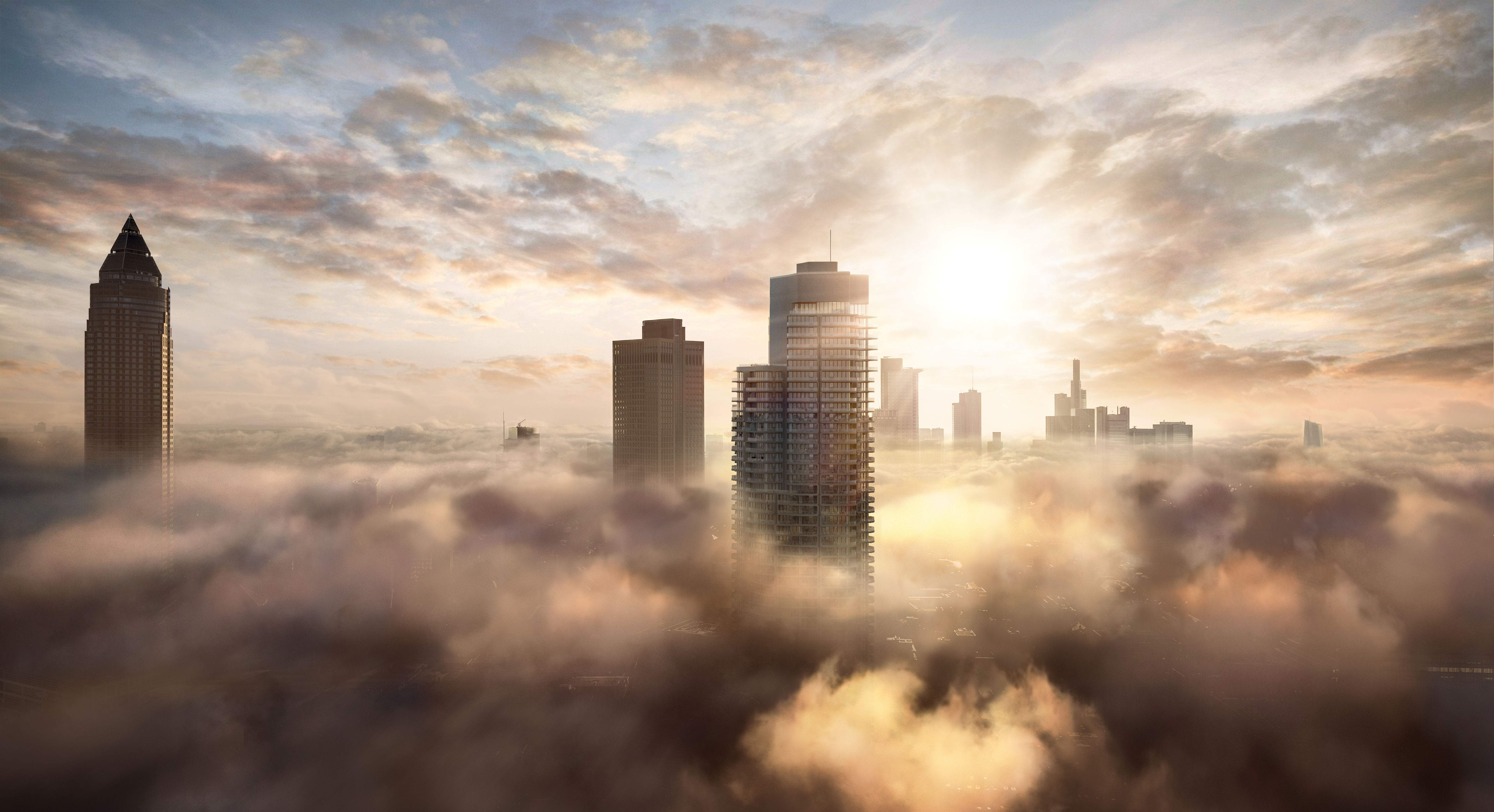 Skyscraper above the clouds at sunrise.