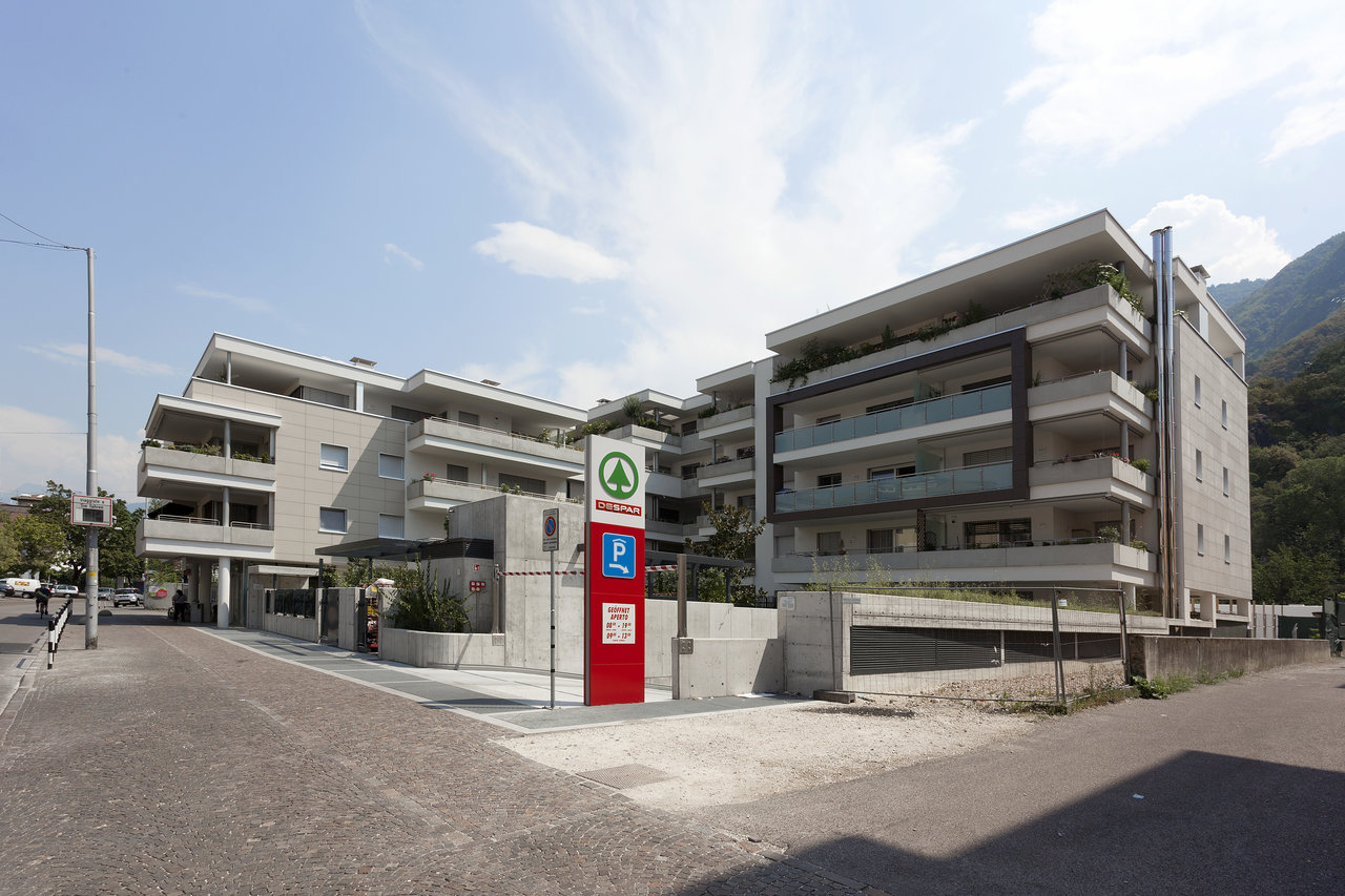 Modern residential complex with balconies and terraces, ideal for high-quality tiles.