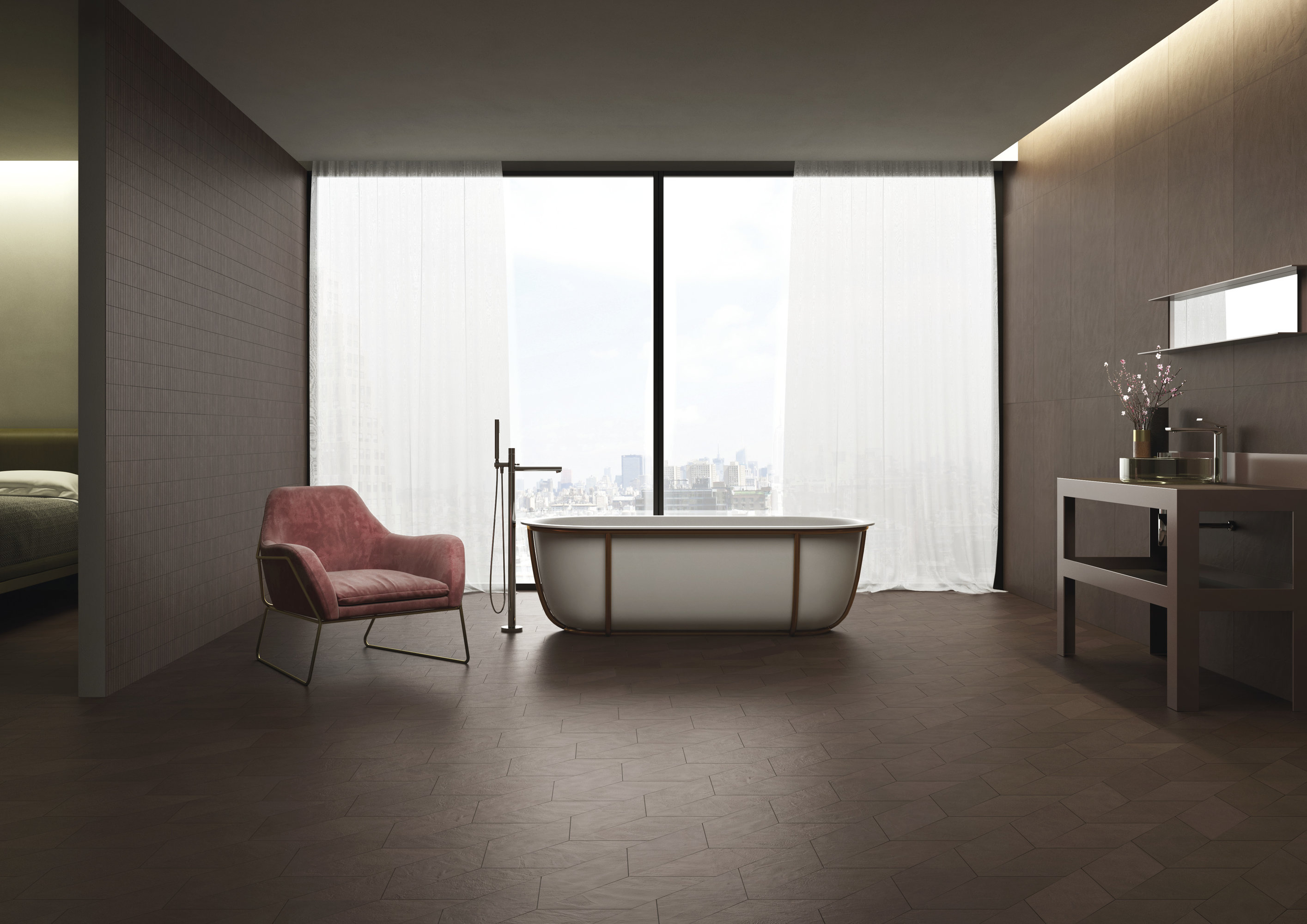 Luxurious bathroom with dark Porcelaingres floor tiles, freestanding bathtub, and armchair.