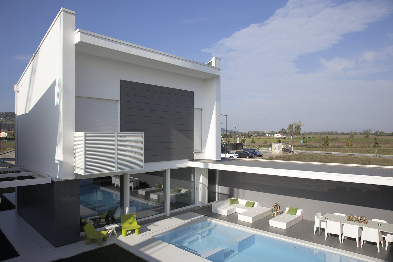 Elegant modern home with pool and premium outdoor tiles.