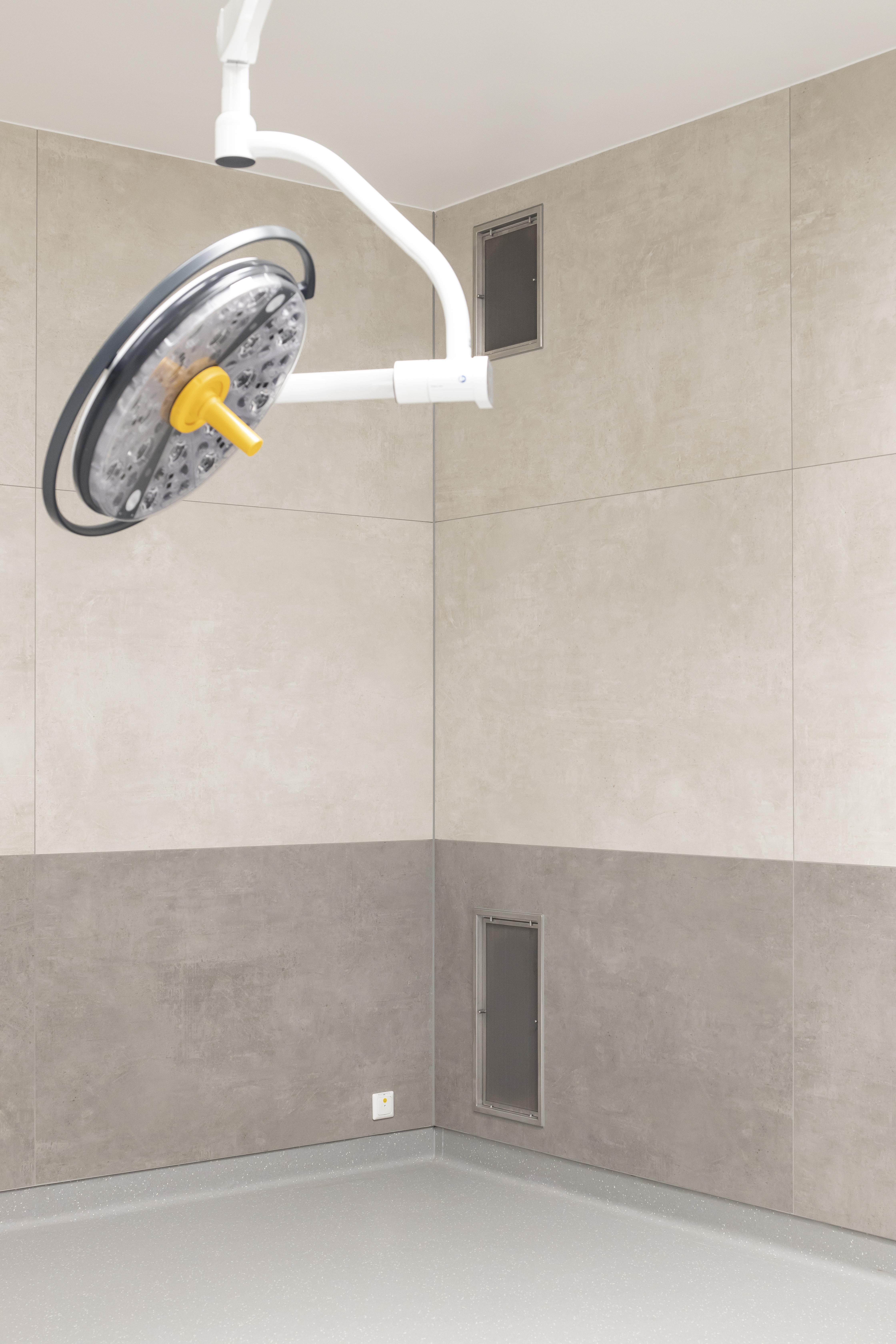 Premium wall tiles in two grey shades for a sleek, modern interior design.