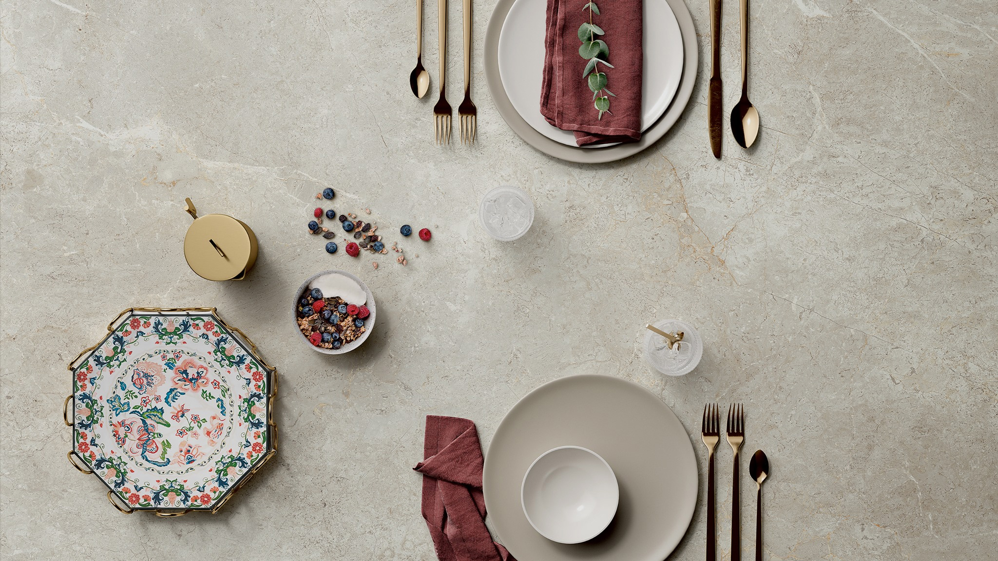 Light, premium natural stone-look tile as a festively set tabletop.