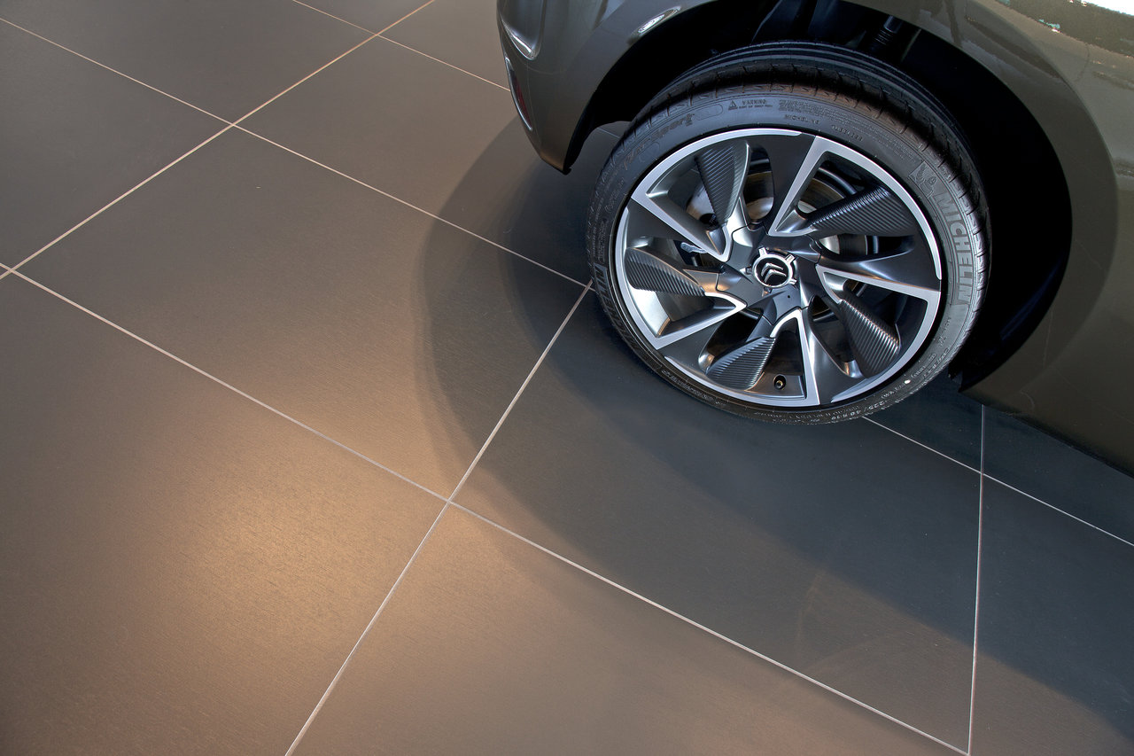 High-quality anthracite tiles with fine joints, ideal for modern showrooms.