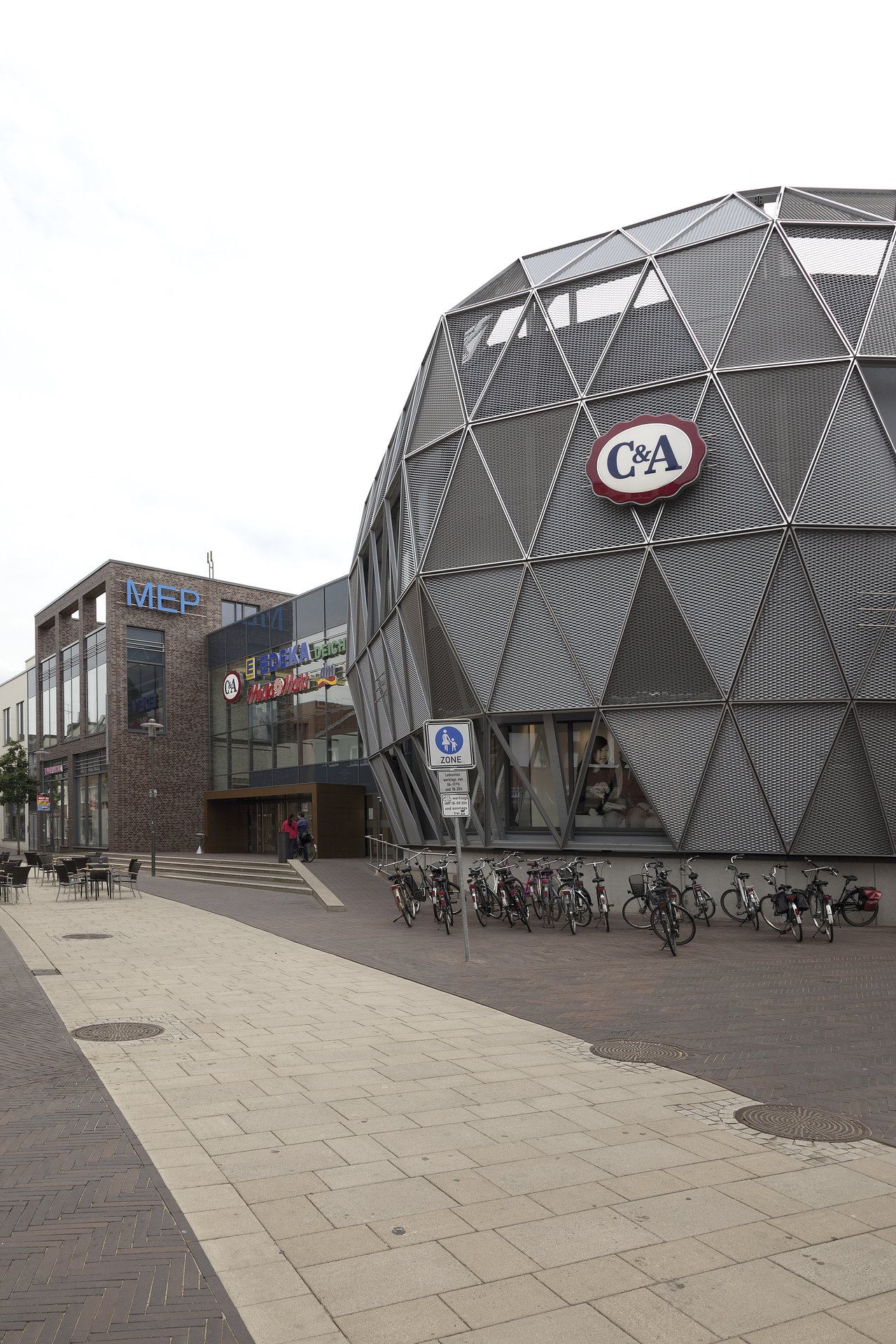 Various outdoor tiles on the forecourt of a shopping centre.