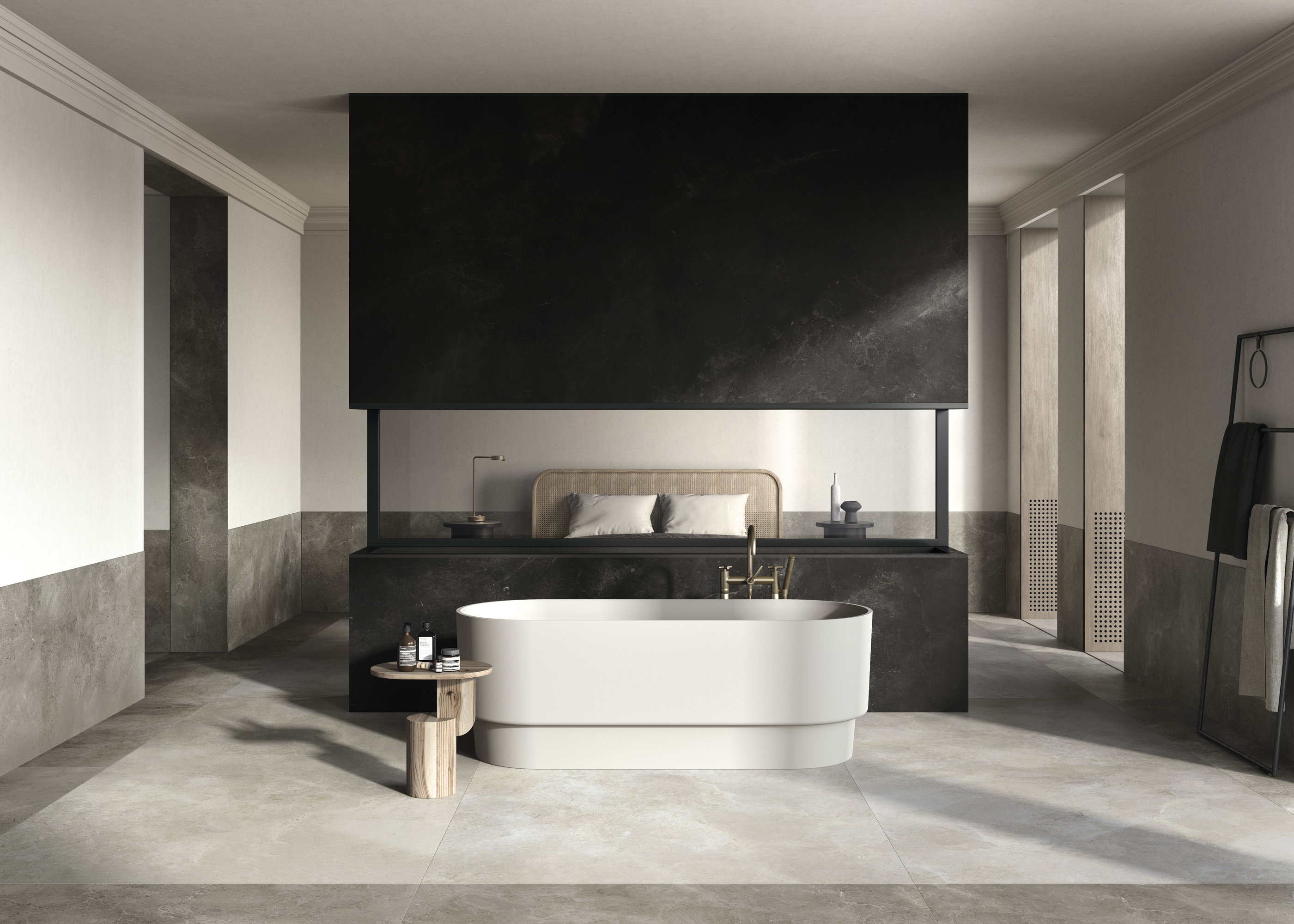 Modern bathroom with large-format concrete-effect tiles and a freestanding bathtub.