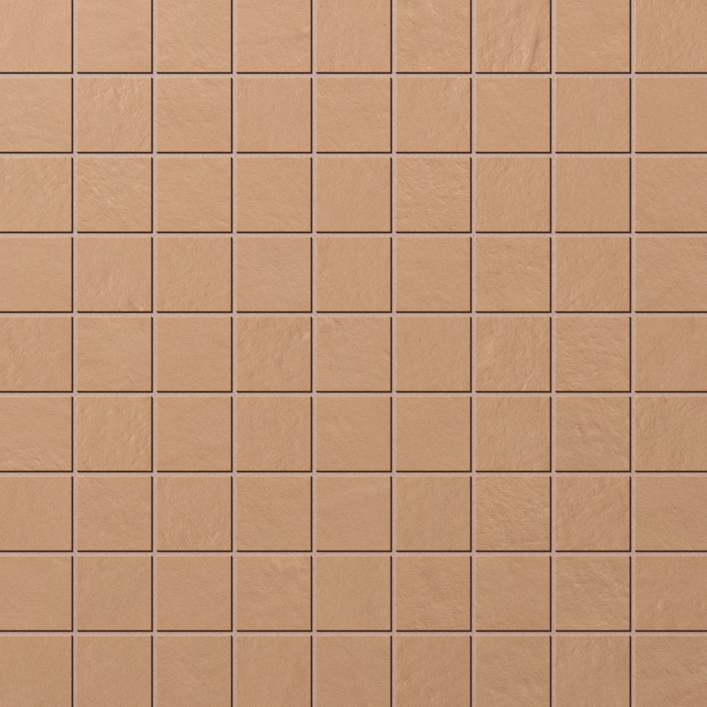 Texture of beige tiles with a subtle grid.