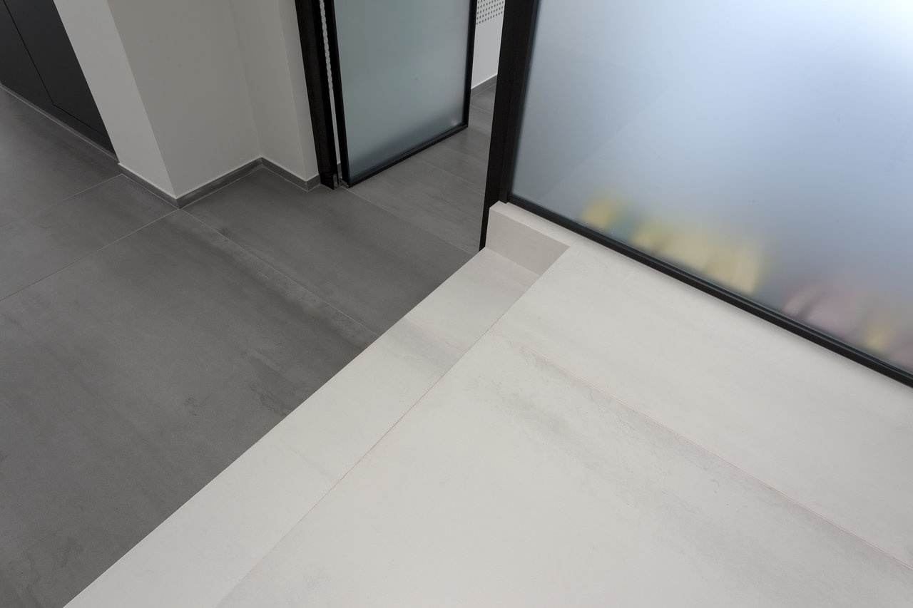 Premium tiles: Light wood effect & grey stone effect.