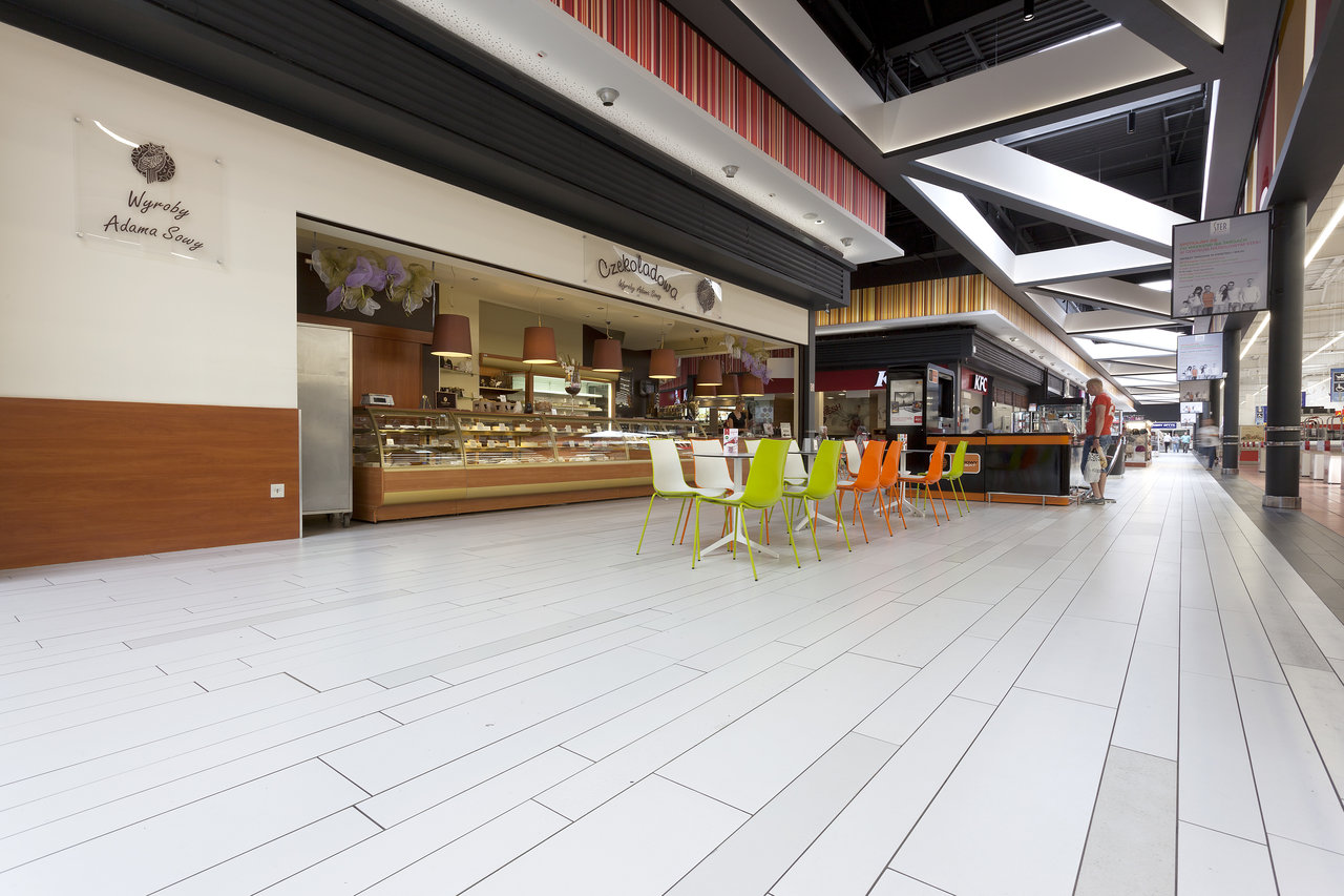 Modern, bright plank-format tiles in a shopping centre.