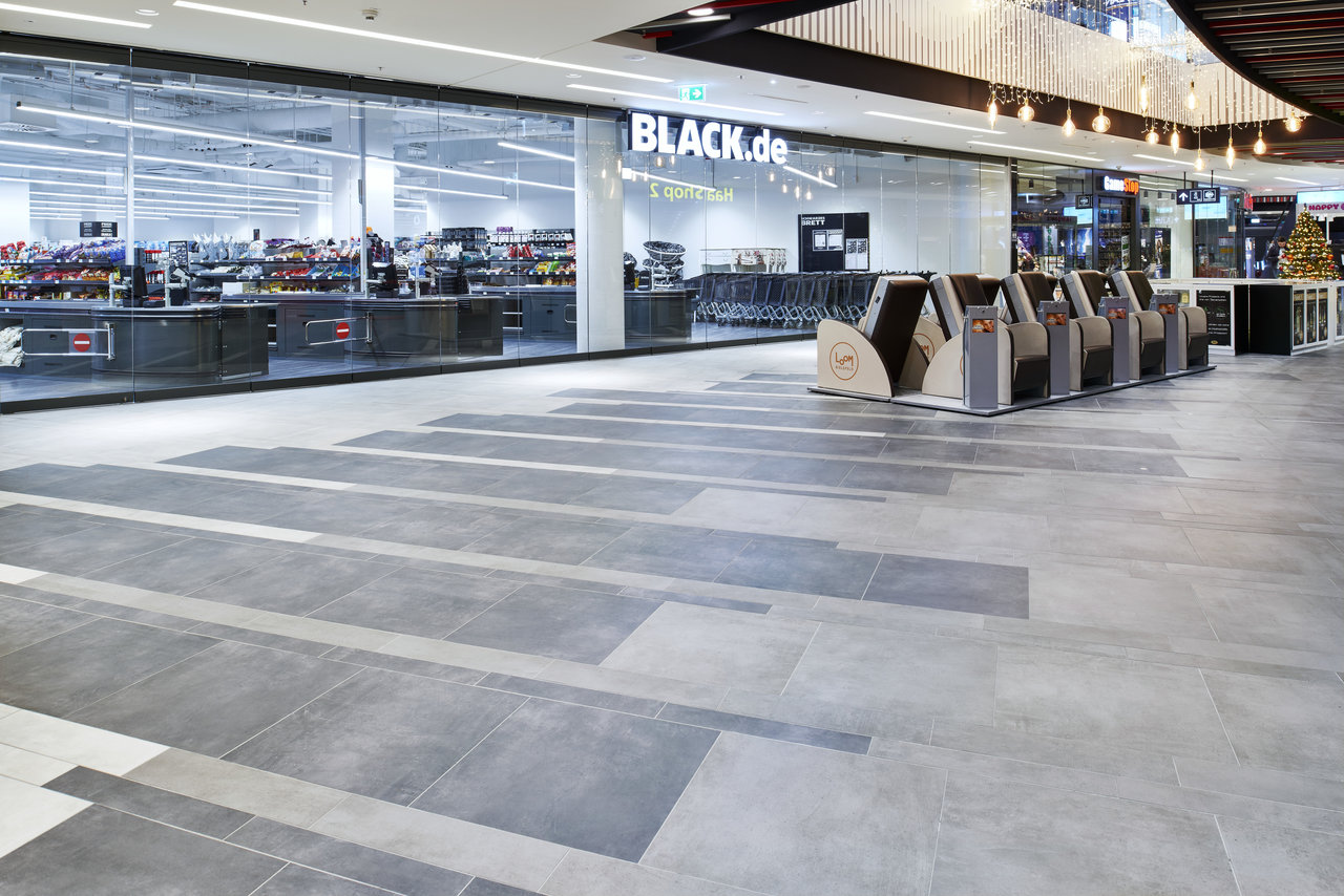 High-quality grey tiles with modern stripe pattern, perfect for indoor areas.